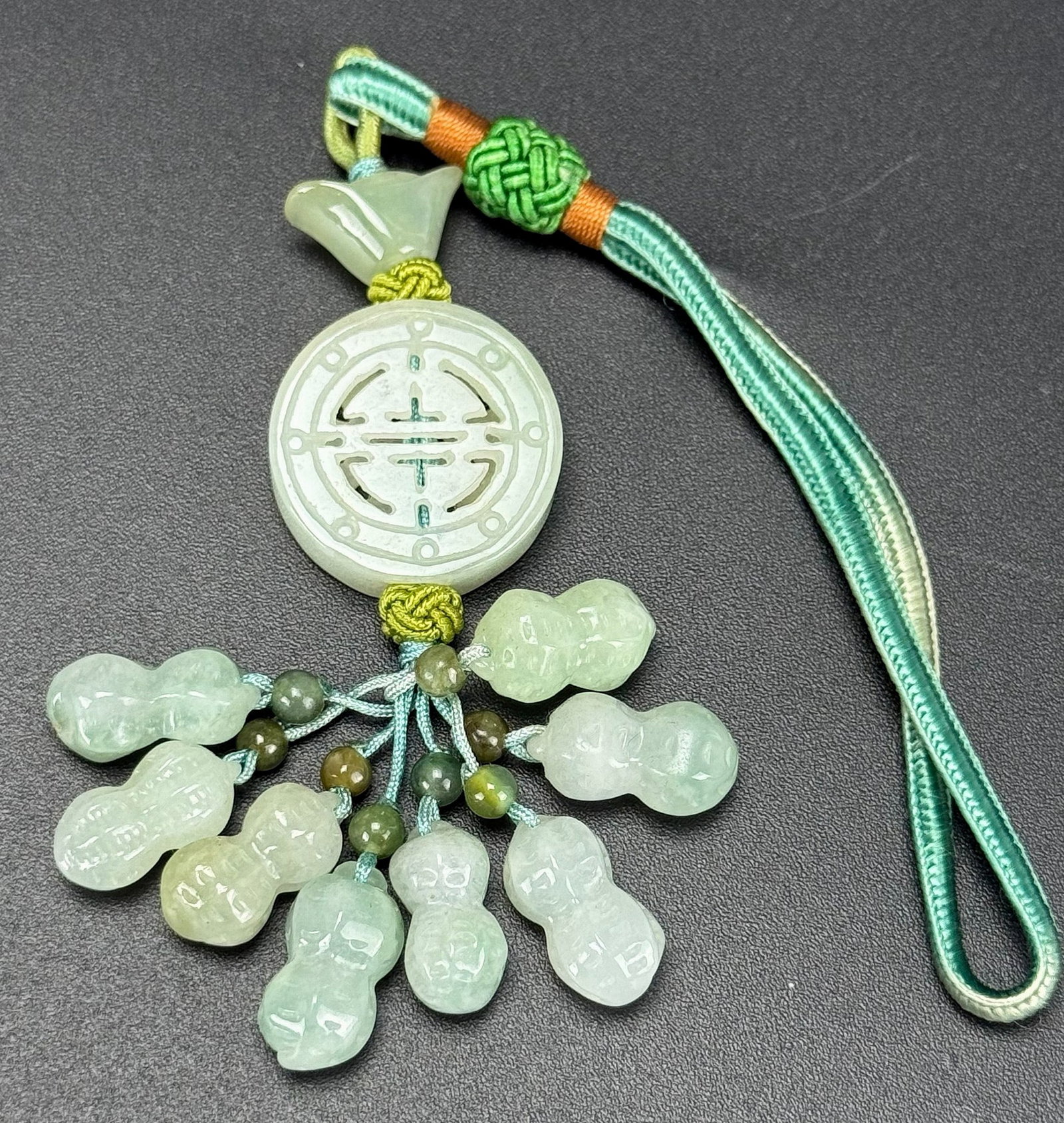 Chinese Carved Jade Pendant: Large Longquan celadon glazed bowl with floral flower pattern,L 18 cm( 7 in.).Preview from Apr 20th to 24th from 1:00 PM TO 5:00 PM Eastern Time, Location: 15229 Display Court, Rockville, MD 20850.