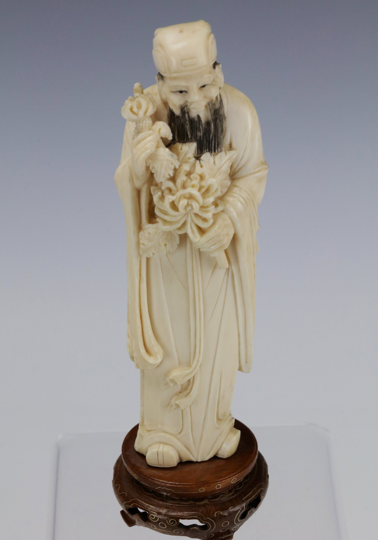 Vintage Chinese Carved Bone of Figurine A Man Holding Chrysanthemum: Vintage Chinese Carved Bone of A Beauty Holding a Flower,H 15.5 cm(6 in).Preview from Apr 20th to 24th from 1:00 PM TO 5:00 PM Eastern Time, Location: 15229 Display Court, Rockville, MD 20850.