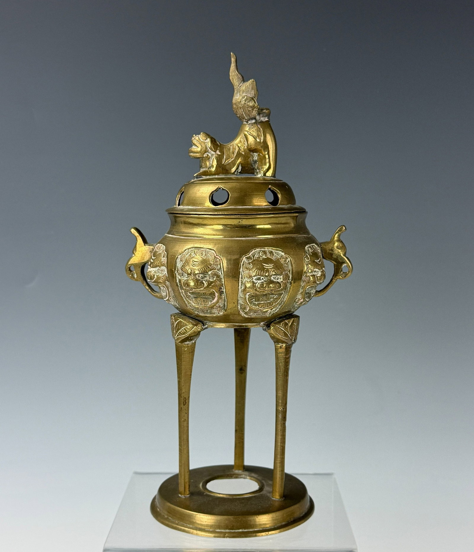 A Vintage Chinese Brass Tripod Censer Lidded: A Vintage Chinese Brass Tripod Censer Lidded, H25cm (9.8in). Preview from Apr 20th to 24th from 1:00 PM TO 5:00 PM Eastern Time, Location: 15229 Display Court, Rockville, MD 20850.