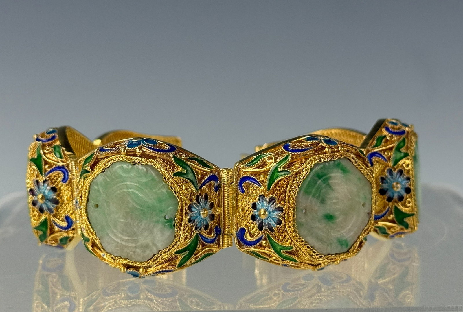Antique Chinese Jade and Enamel Filigree Bracelet: Antique Chinese Jade and Enamel Filigree Bracelet. L19cm (7.5in).Preview from Apr 20th to 24th from 1:00 PM TO 5:00 PM Eastern Time, Location: 15229 Display Court, Rockville, MD 20850.