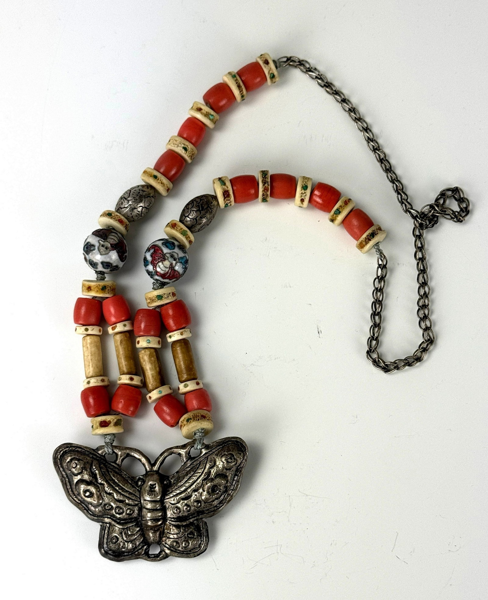 Chines Beaded Necklace with Scrap Silver Butterfly Shaped Pendant: Beaded Necklace with Scrap Silver Butterfly-Shaped Pendant, L 70cm(27.6 in.) Butterfly W8.5cm (3.3in). Preview from Apr 20th to 24th from 1:00 PM TO 5:00 PM Eastern Time, Location: 15229 Display Court