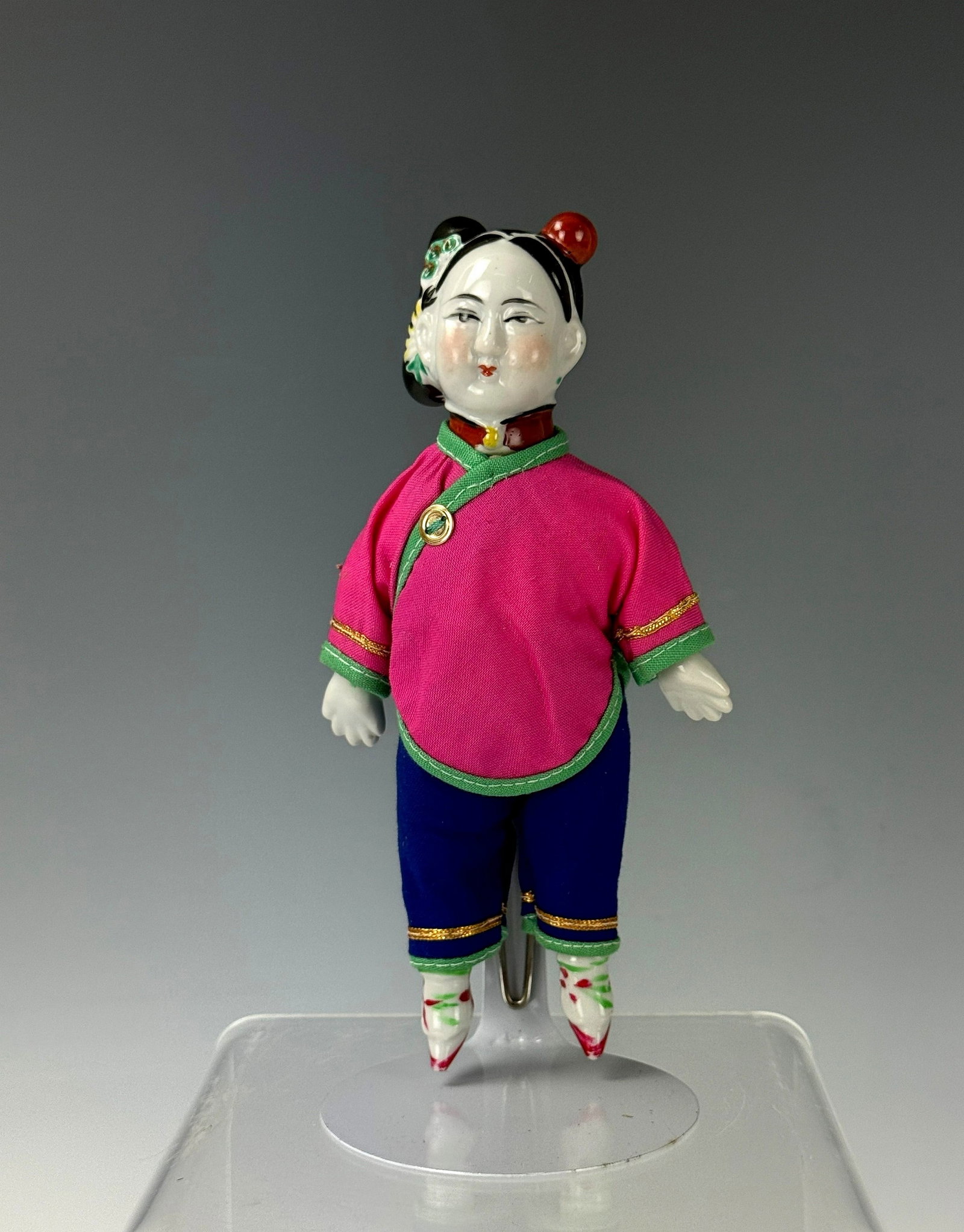A Vintage Chinese Porcelain Doll: A Vintage Chinese Doll,made of Porcelain and Fabric. H17.5 cm(6.9 in.) .Preview from Apr 20th to 24th from 1:00 PM TO 5:00 PM Eastern Time, Location: 15229 Display Court, Rockville, MD 20850.