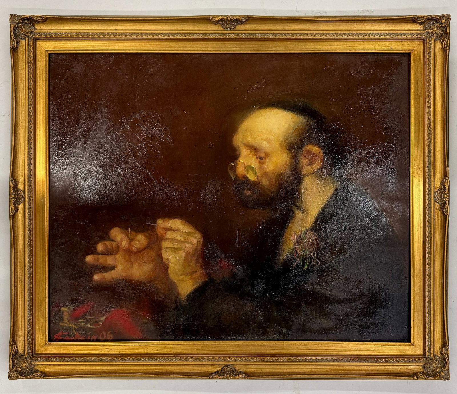 An Oil Painting On Canvas Signed A Kachkin: An Oil Painting, A man in Profile wearing Glasses and Holding a Needle Signed Kachkin. frame H 90.2cm (35.5in.) x D76.2 cm ( 30in ) . Preview from Apr 20th to 24th from 1:00 PM TO 5:00 PM Eastern Time