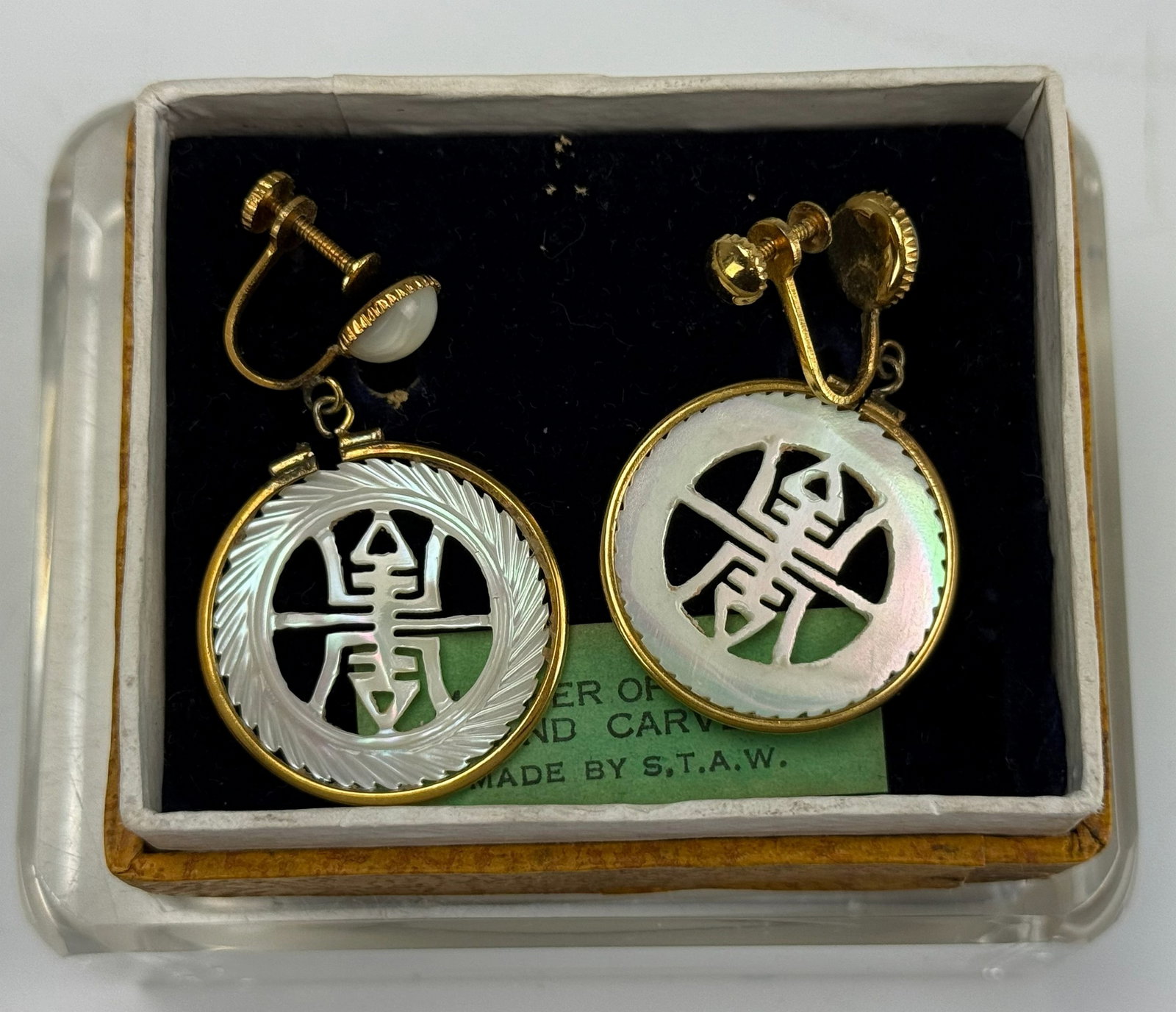 Pair of Vintage Screw Back Earrings with Mother Of Pearl: Pair of Vintage Screw Back Earrings with Mother Of Pearl, size 4 x 3 cm . Preview from Apr 20th to 24th from 1:00 PM TO 5:00 PM Eastern Time, Location: 15229 Display Court, Rockville, MD 20850.