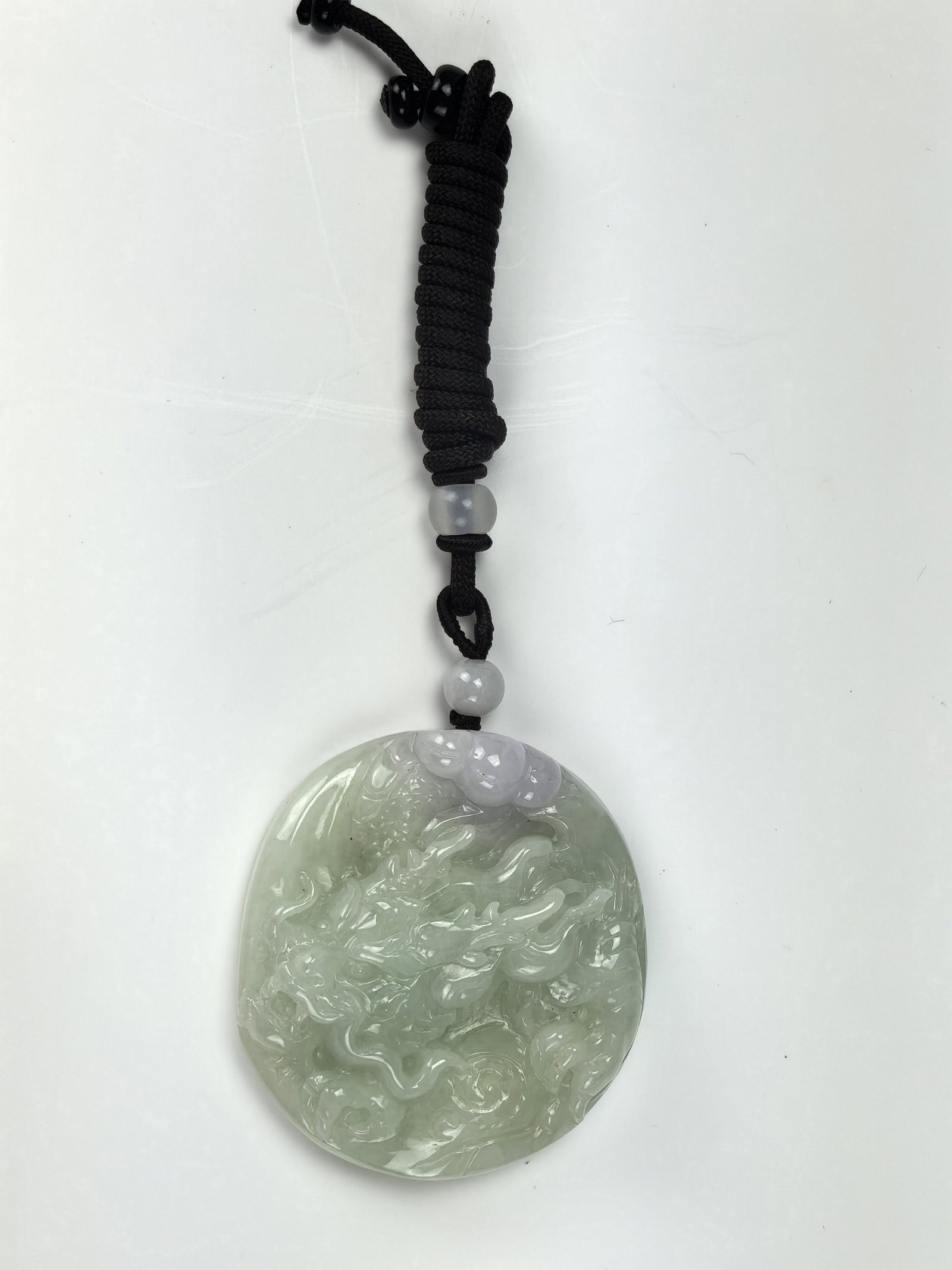 Chinese Jadeite Dragon Pendant: Chinese Jadeite Dragon Pendant ,size 5.5 x4.5 cm. Preview from Apr 20th to 24th from 1:00 PM TO 5:00 PM Eastern Time, Location: 15229 Display Court, Rockville, MD 20850.