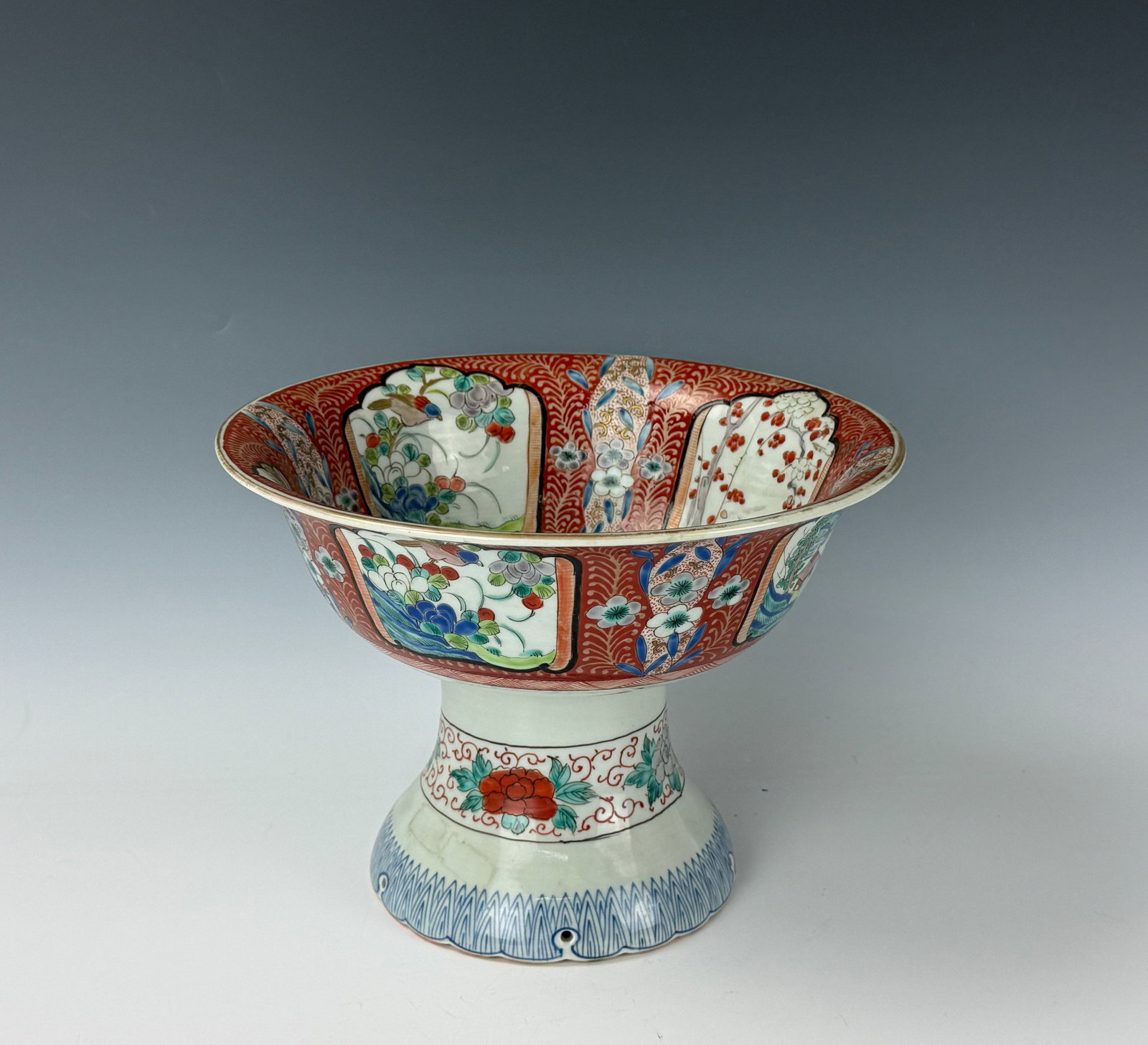 An Antique Japanese Imari Porcelain Footed Centerpiece Bowl Marked: An Antique Japanese Imari Porcelain Footed Centerpiece Bowl Marked. Size H23cm (9in) x D30.5cm (12in). Preview from Apr 20th to 24th from 1:00 PM TO 5:00 PM Eastern Time, Location: 15229 Display Court
