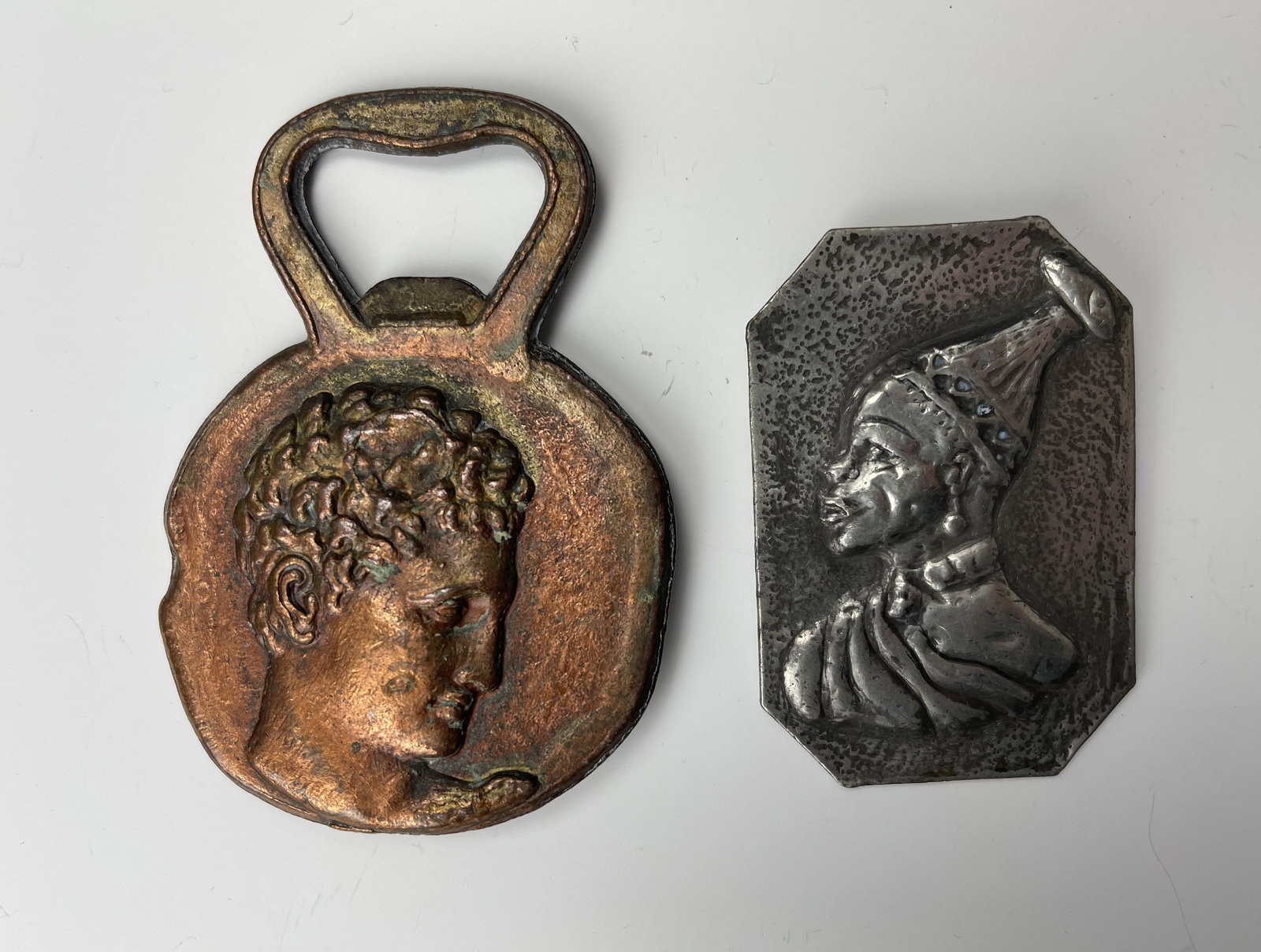 A Vintage Bronze Bottle Opener and A Pewter Brooch: A Vintage Bronze Bottle Opener and A Pewter Brooch, a Vintage Brutalist Style Bronze Bottle Opener with Human Head Made in Greece. H 8cm (3.1in). Preview from Apr 20th to 24th from 1:00 PM TO 5:00 PM