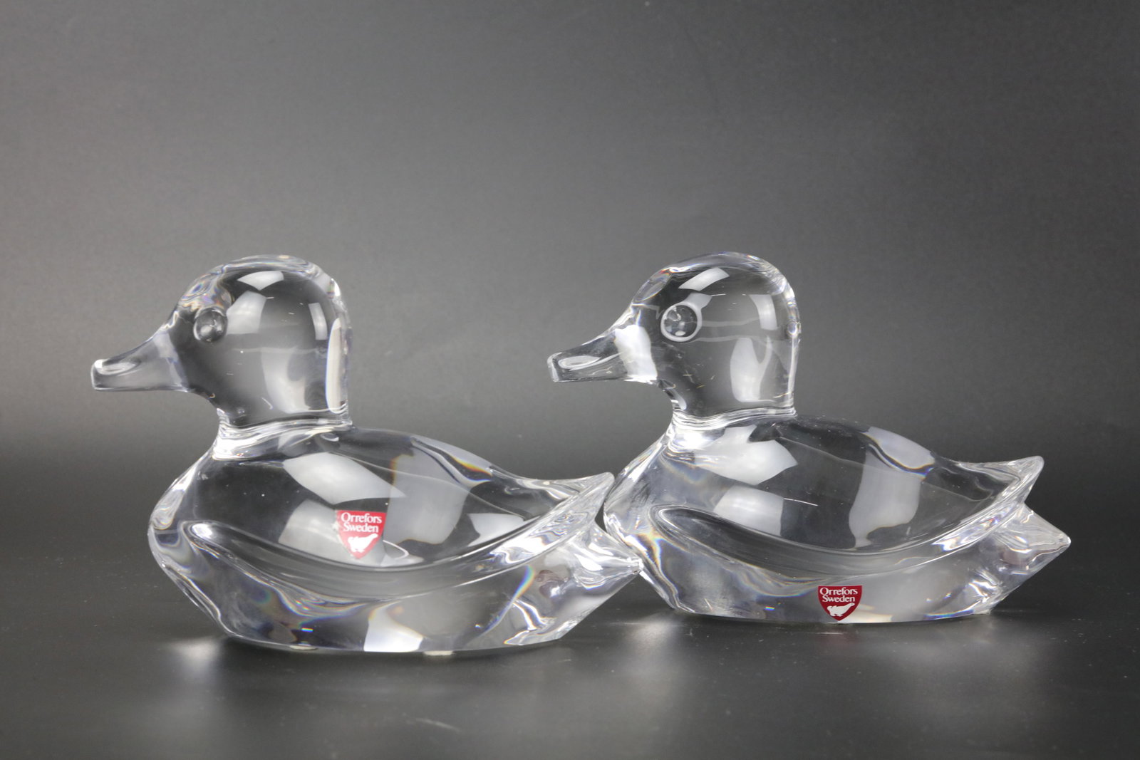 2 Pieces Orrefors Sweden Crystal Duck Figurines. H10cm(4in), W15cm(6in). Preview from Apr 20th to: 2 Pieces Orrefors Sweden Crystal Duck Figurines. H10cm(4in), W15cm(6in). Preview from Apr 20th to 24th from 1:00 PM TO 5:00 PM Eastern Time, Location: 15229 Display Court, Rockville, MD 20850.