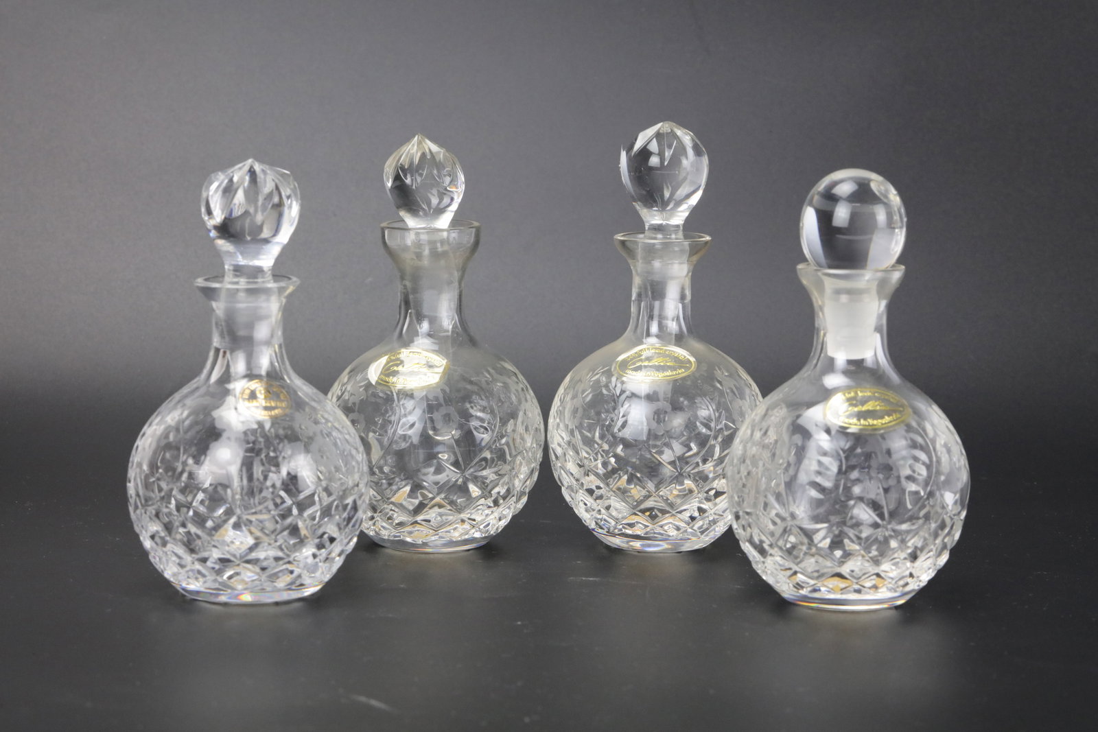4 Pieces 24% Full Lead Crystal Perfume Bottles Made in Yugoslavia H12cm(4.8in). Preview from Apr: 4 Pieces 24% Full Lead Crystal Perfume Bottles Made in Yugoslavia H12cm(4.8in). Preview from Apr 20th to 24th from 1:00 PM TO 5:00 PM Eastern Time, Location: 15229 Display Court, Rockville, MD 20850.