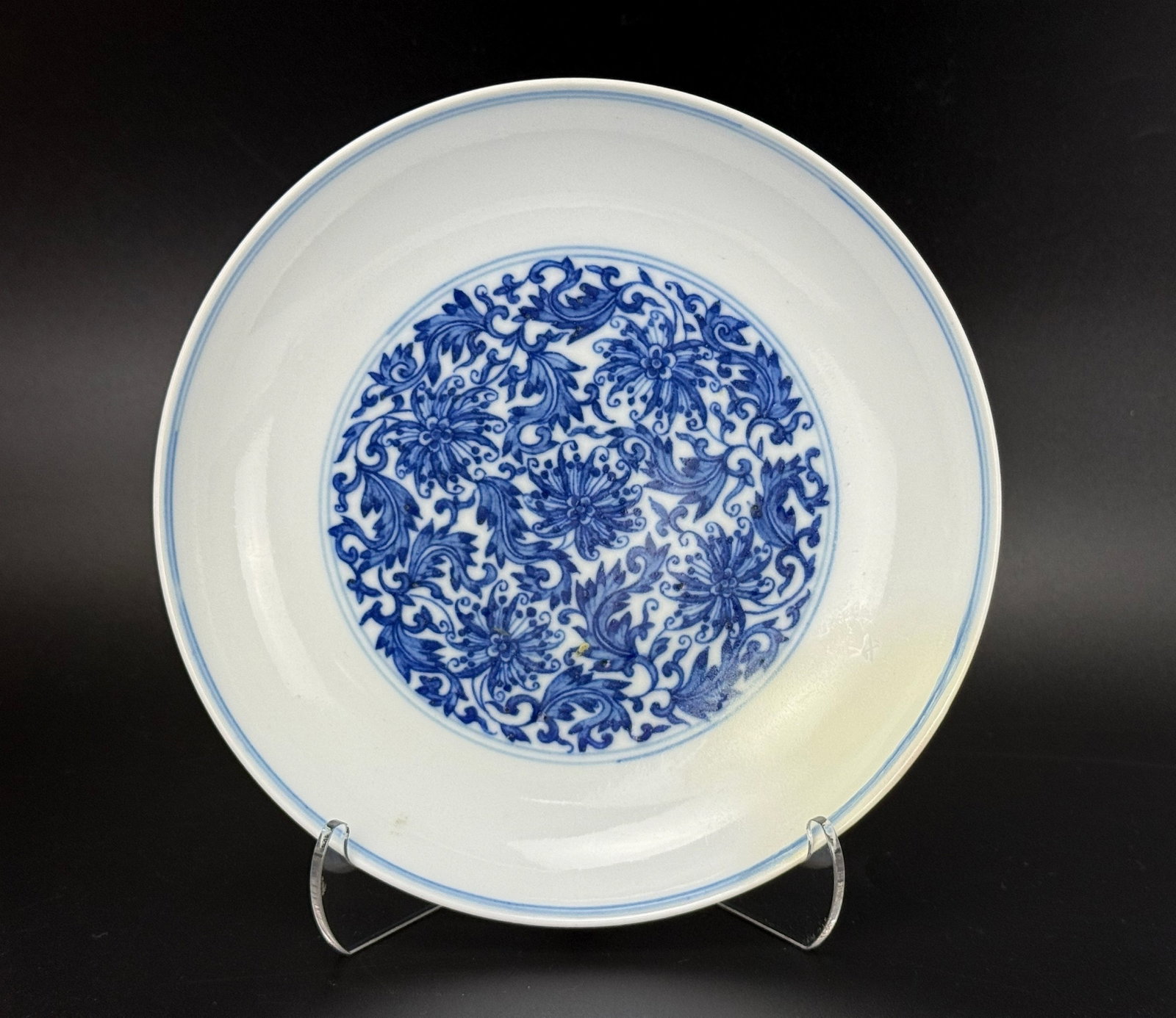 Qing Yongzheng Blue and White Porcelain Plate: Chinese Qing Dynasty Blue and White Porcelain Plate, with central floral design, seal mark and period of Yongzheng. sold as is. Size D 15.5 cm(6.1 in.). Preview from June 22nd to 26th from 1:00 PM TO 