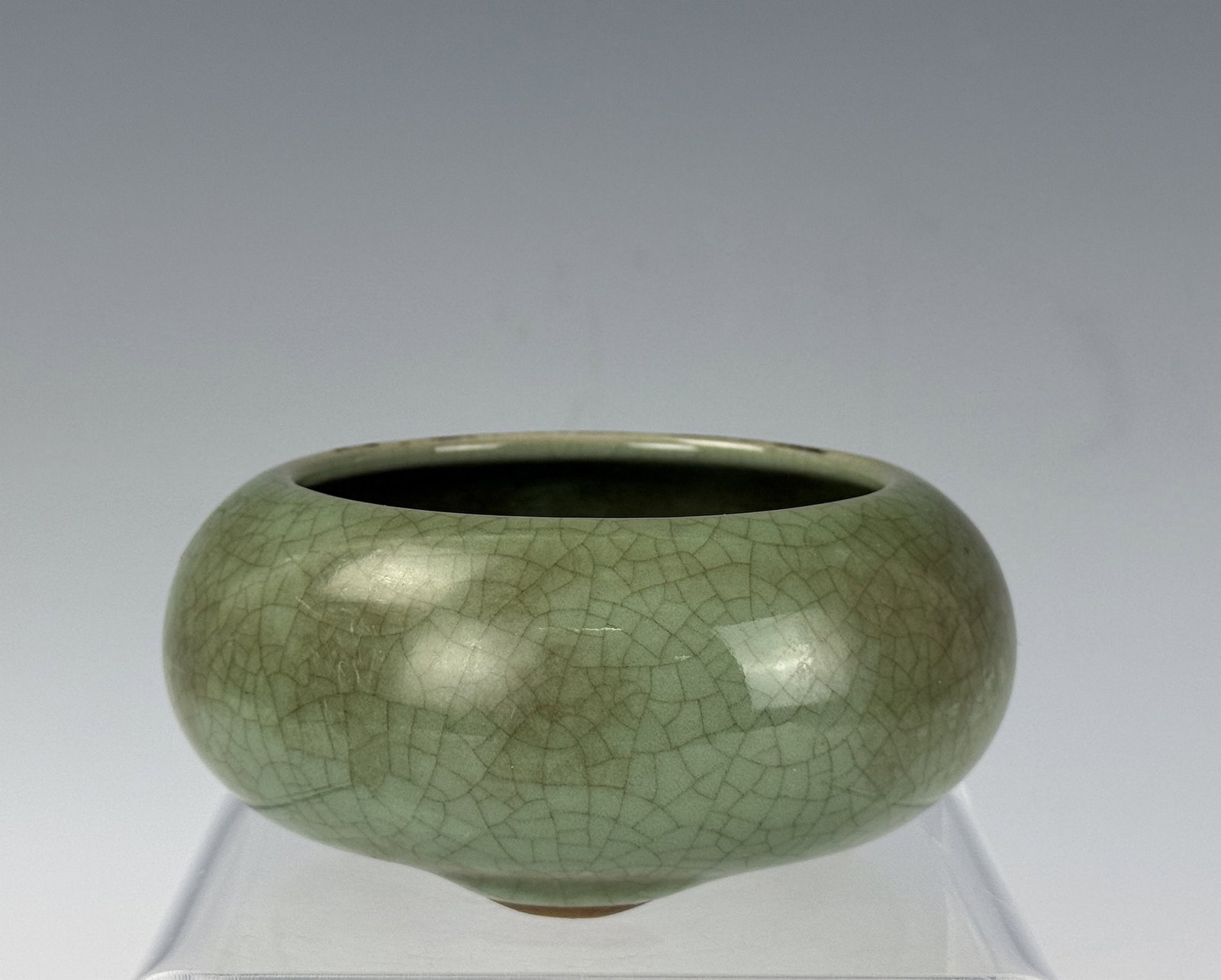 Chinese Green Crackle Glazed Porcelain Tripod Censer: Chinese Green Crackle Glazed Porcelain Tripod Censer. D 11cm(4.3in.) x H 4.5cm(1.7in.). Preview from June 22nd to 26th from 1:00 PM TO 5:00 PM Eastern Time, Location: 15229 Display Court, Rockville, M