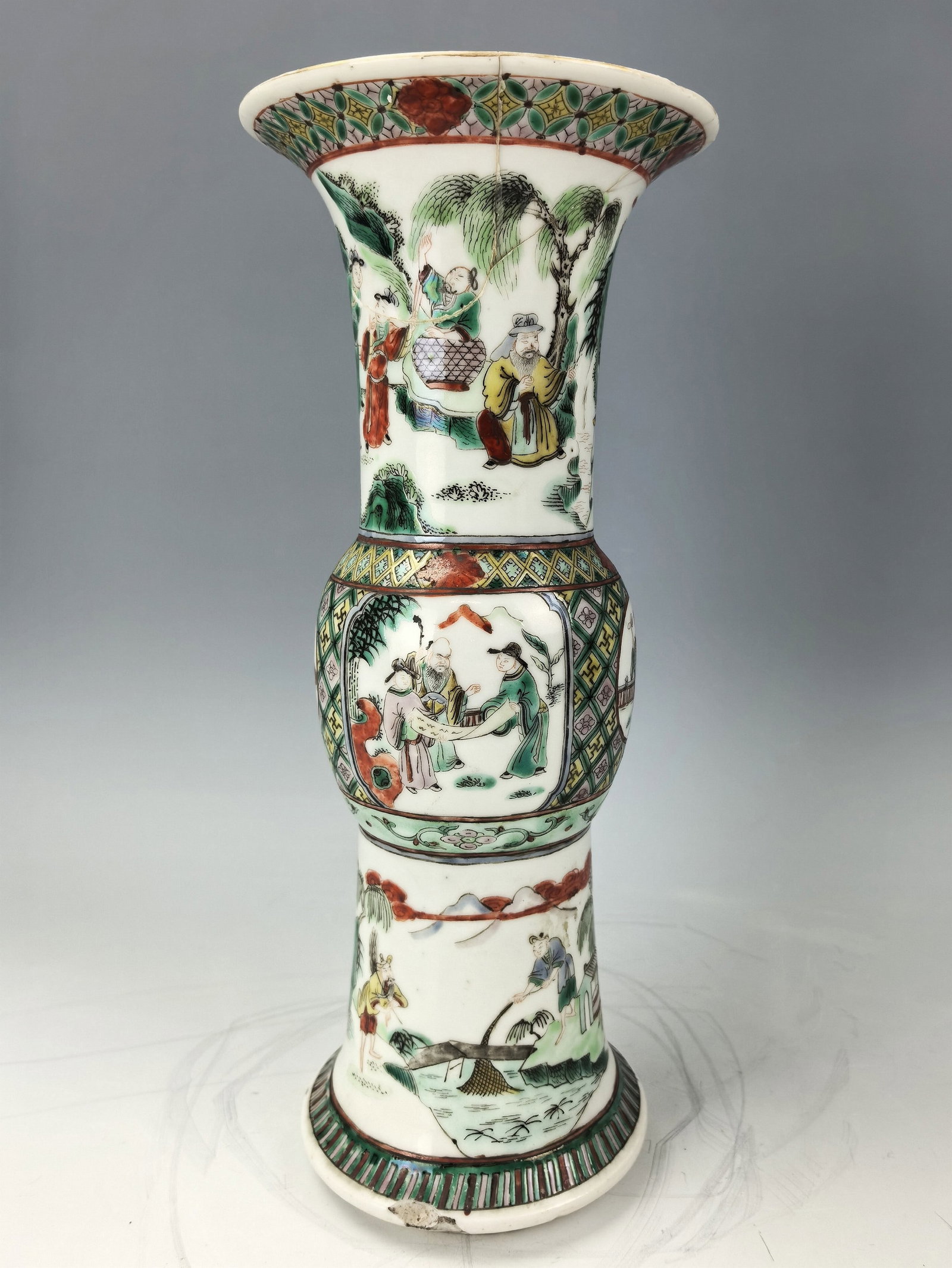 Chinese Famille Verte Porcelain Gu Vase: Chinese Famille Verte Porcelain Gu Vase,repaid with hireline,sold as is. H 30 cm(12 in.). Preview from June 22nd to 26th from 1:00 PM TO 5:00 PM Eastern Time, Location: 15229 Display Court, Rockville,