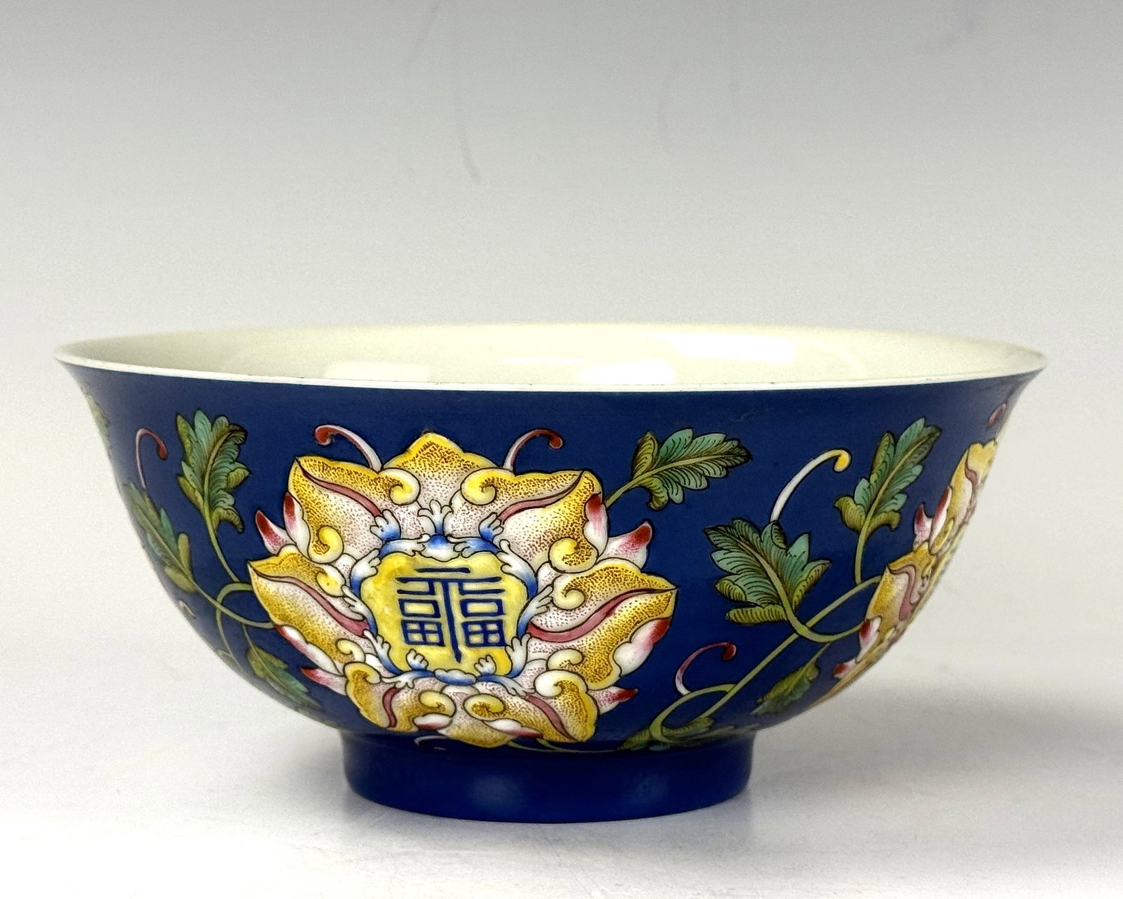 Chinese Blue Enamel Porcelain Bowl Kangxi Mark: Blue enamel bowl painted with flowers. Kangxi Mark in blue enamel. D 14.5cm(5.7in.) x H 6.5cm(2.6in.). Preview from June 22nd to 26th from 1:00 PM TO 5:00 PM Eastern Time, Location: 15229 Display Cour