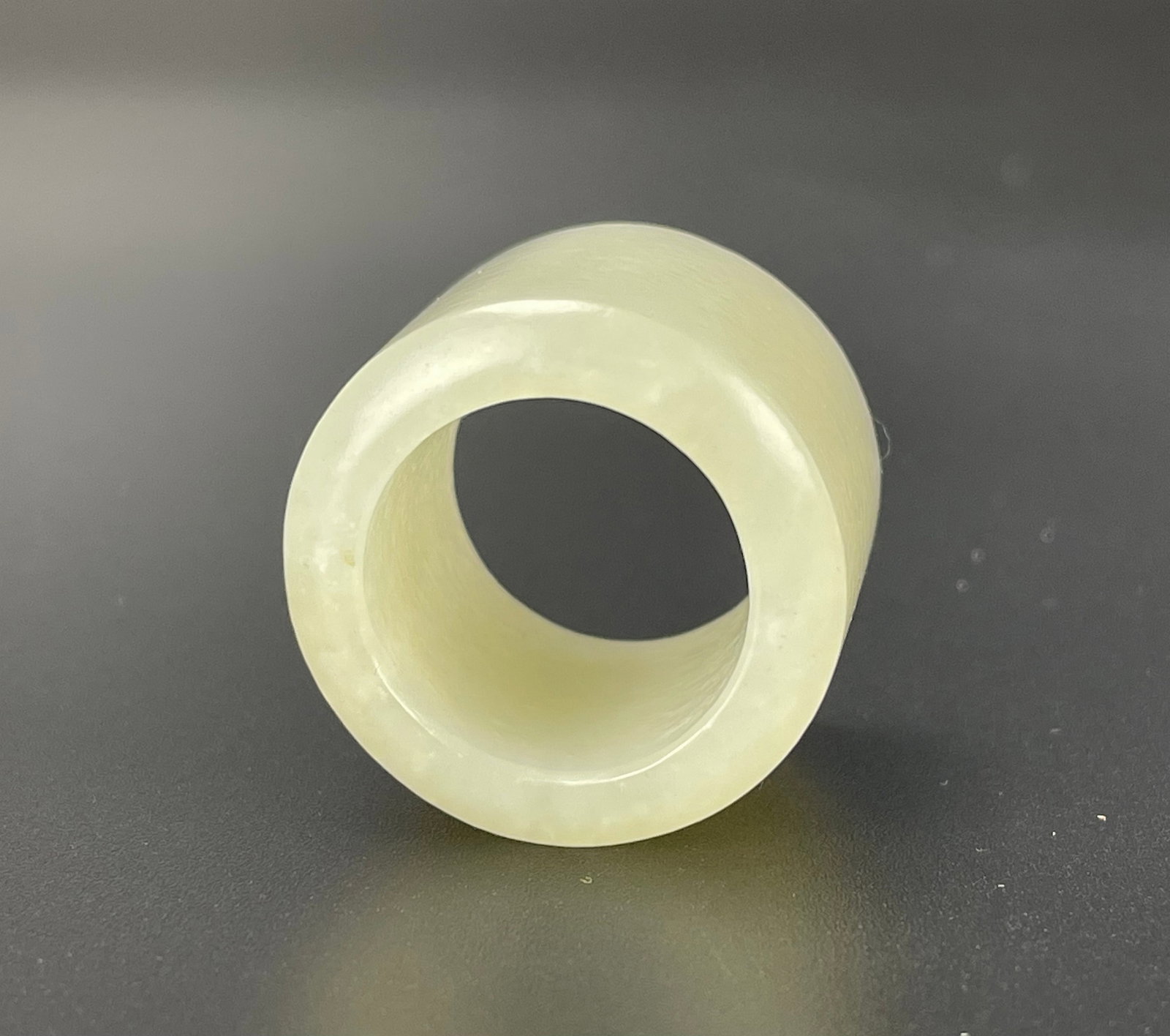 Chinese Hetian Celadon Jade Archers Ring: Chinese hetian celadon jade archers ring. Size 3 x 2.5 cm. Preview from June 22nd to 26th from 1:00 PM TO 5:00 PM Eastern Time, Location: 15229 Display Court, Rockville, MD 20850.