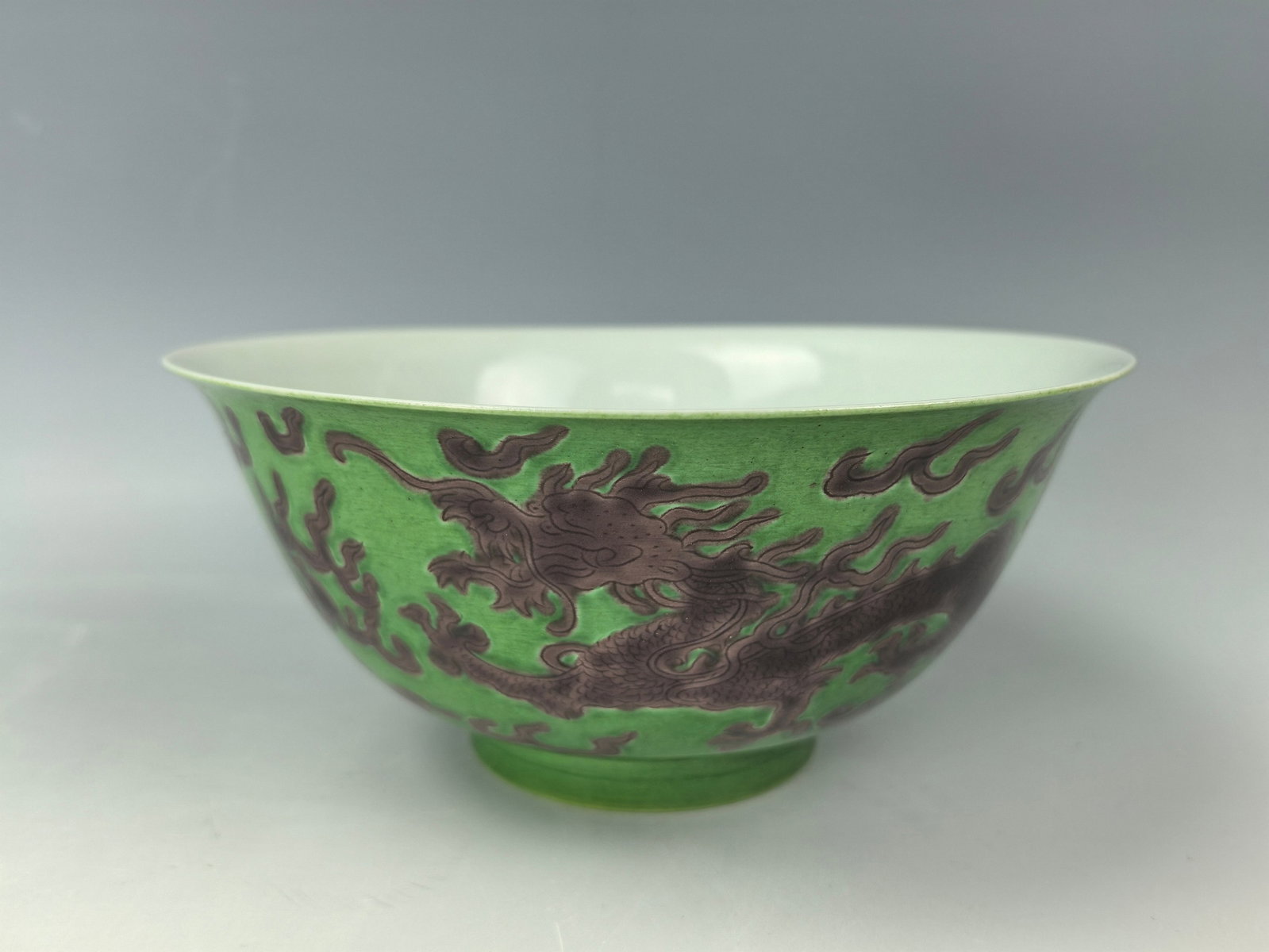Chinese Porcelain Bowl with Incised Aubergine Glazed Dragon Yongzheng Mark: Chinese porcelain bowl with incised aubergine glazed dragon Yongzheng Mark.D 18 cm(7.1 in.) x H 8 cm(3.2 in.). Preview from June 22nd to 26th from 1:00 PM TO 5:00 PM Eastern Time, Location: 15229 Disp