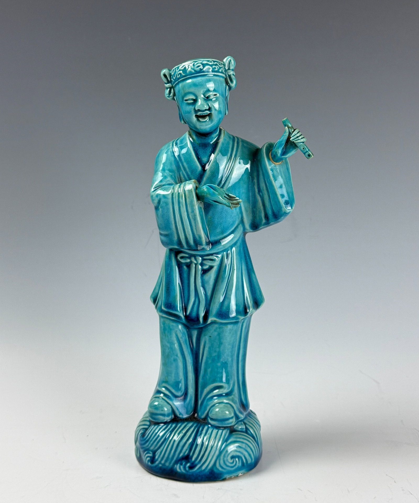 A Chinese Turquoise Blue Glazed Porcelain Figurine (1 of 8)