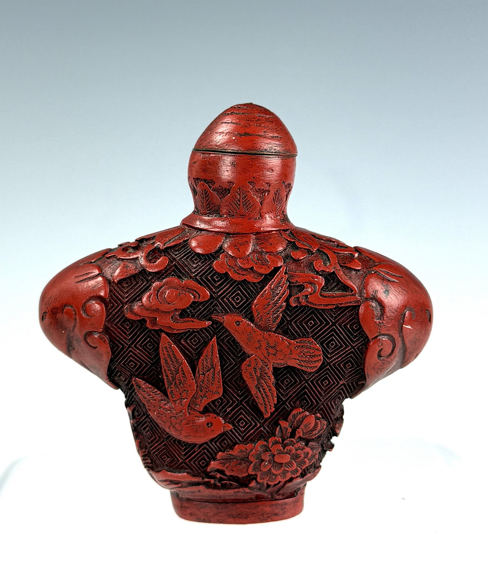 Chinese Red Cinnabar Carved Snuff Bottle with Eagle and Bear (1 of 2)