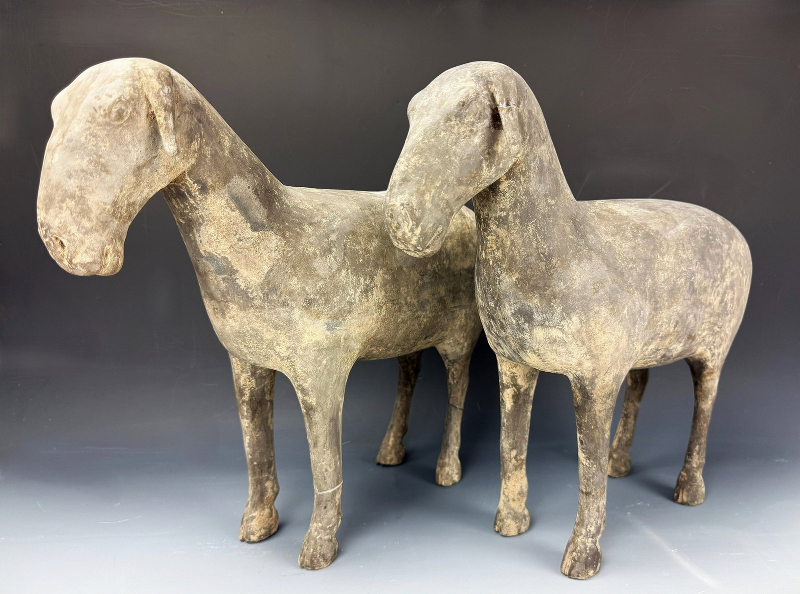 Pair of Chinese Han Dynasty Grey Pottery Figure of Goat (202BC-220AD): Pair of Chinese Han Dynasty (202BC-220AD) Grey Pottery Figure of Goats, L 45cm(17.7in.) x H 37cm(14.6in.) x W 11.5cm(4.5in.) x2. Preview from June 22nd to 26th from 1:00 PM TO 5:00 PM Eastern Time, Lo