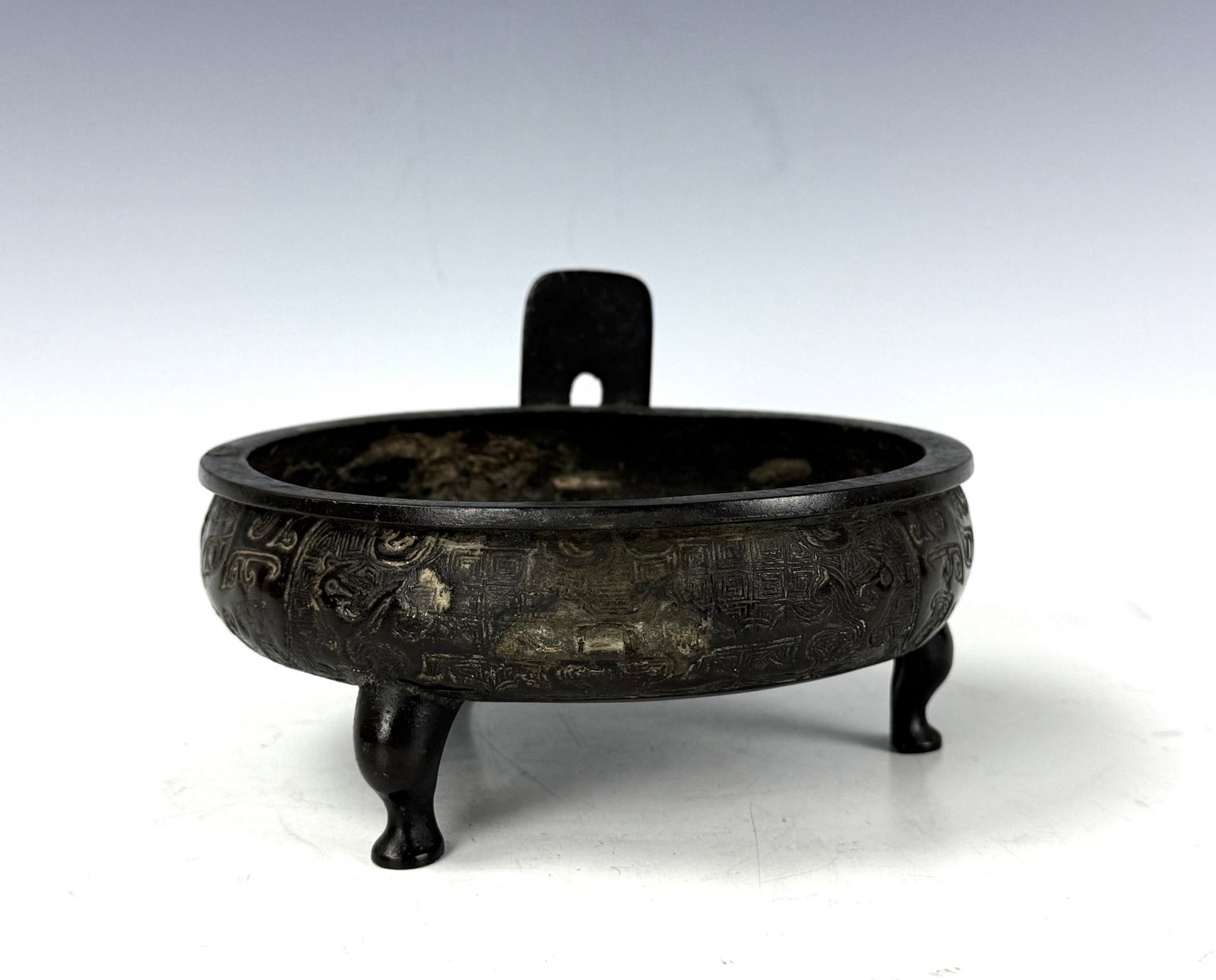 Chinese Bronze Tripod Censer with A Handle Marked: Chinese Bronze Tripod Censer with A Handle Marked. W 18cm(7in.) x H 9.5cm(3.7in.). Preview from June 22nd to 26th from 1:00 PM TO 5:00 PM Eastern Time, Location: 15229 Display Court, Rockville, MD 208