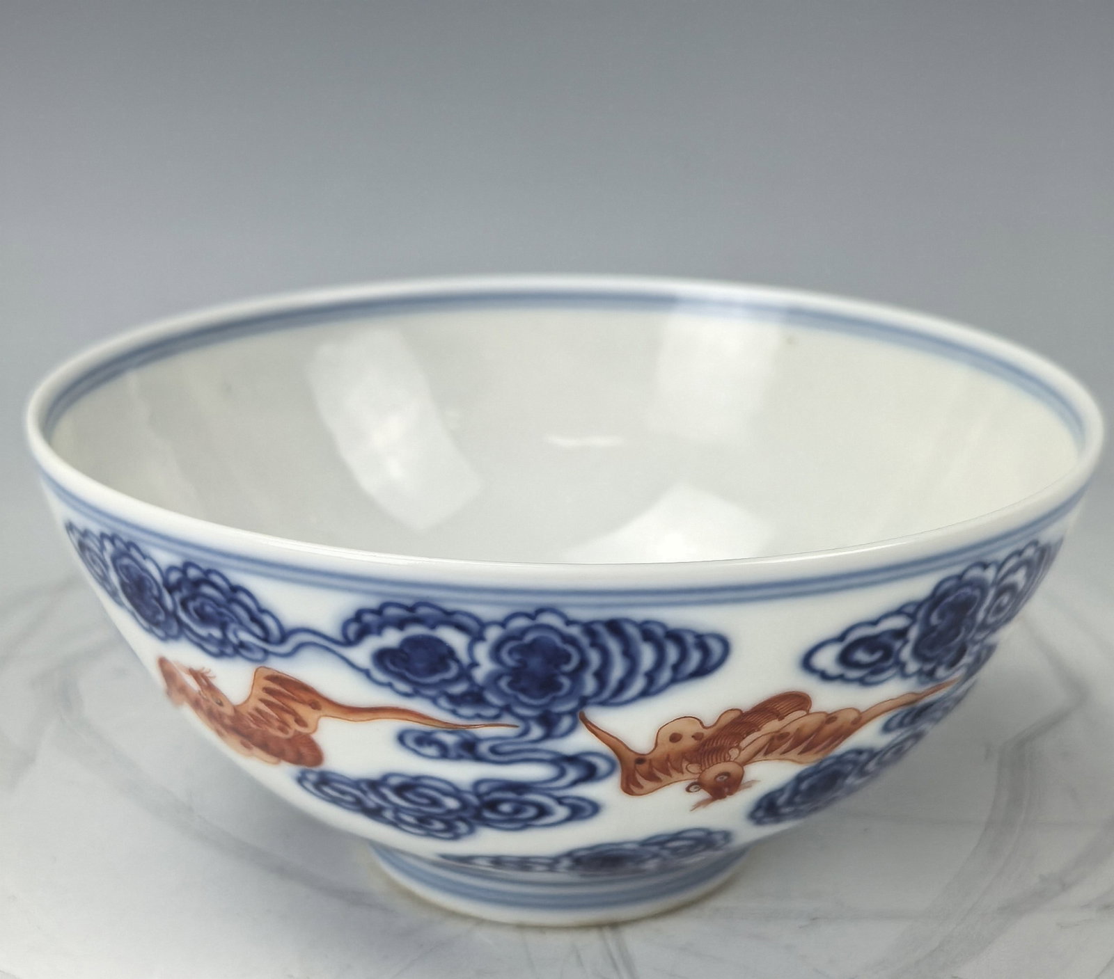 Chinese Blue Cloud and Iron Red Bats Porcelain Bowl with Daoguang Mark: Chinese Blue Cloud and Iron Red Bats Porcelain Bowl with Daoguang Mark. D 13cm(5.1 in.) x H 6cm(2.4in.). Preview from June 22nd to 26th from 1:00 PM TO 5:00 PM Eastern Time, Location: 15229 Display Co