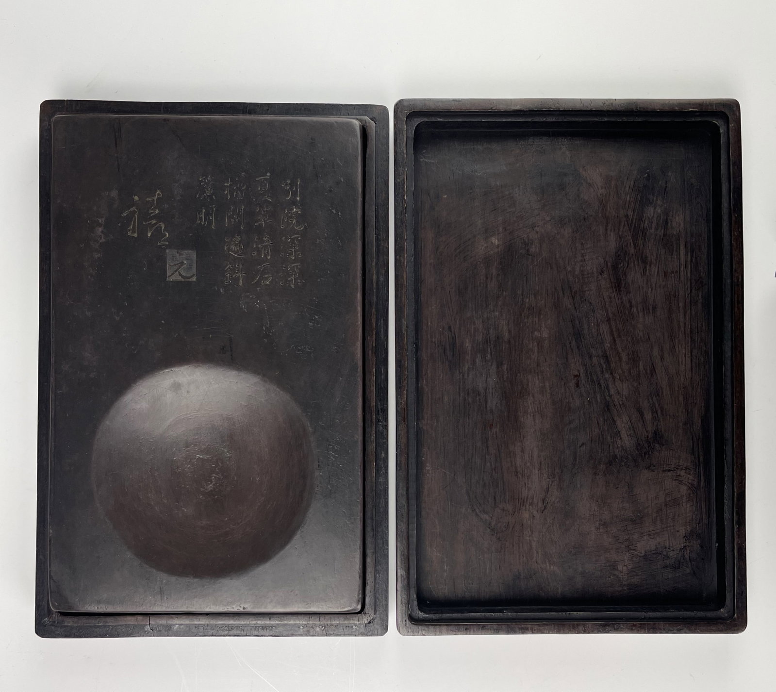 A Chinese Scholars Inkstones with Wood Case: A Chinese Scholars Inkstones with Wood Case,W25 cm (10in.)xD 16 cm (6.5in.)x H 5 cm( 2 in.). Preview from June 22nd to 26th from 1:00 PM TO 5:00 PM Eastern Time, Location: 15229 Display Court, Rockvil