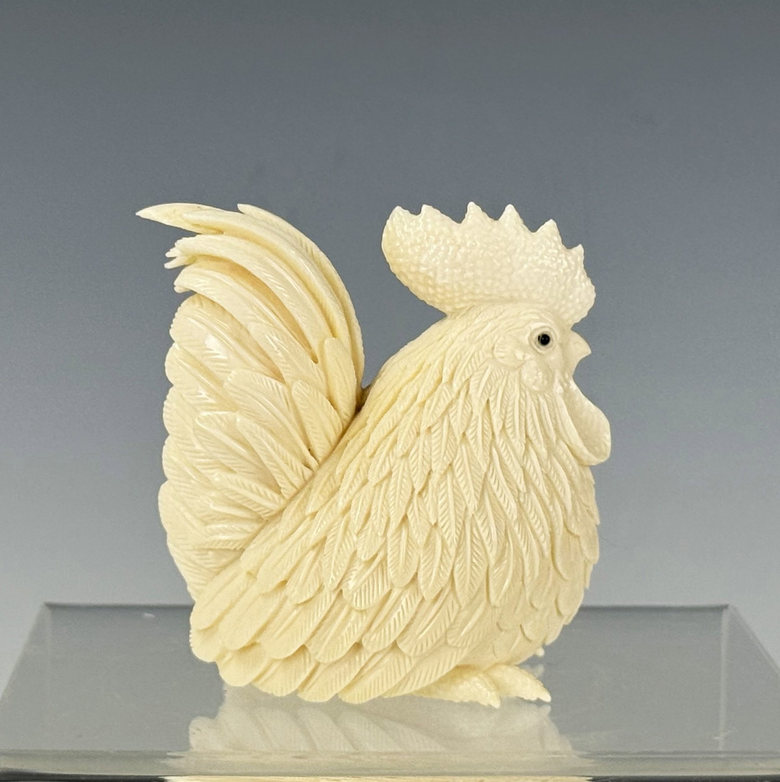 Asian Vintage Carved Cattle Bone Rooster Figure: Asian Vintage Carved Cattle Bone Rooster Figure.size 6 x 6 x 4.3 cm Preview from June 22nd to 26th from 1:00 PM TO 5:00 PM Eastern Time, Location: 15229 Display Court, Rockville, MD 20850.