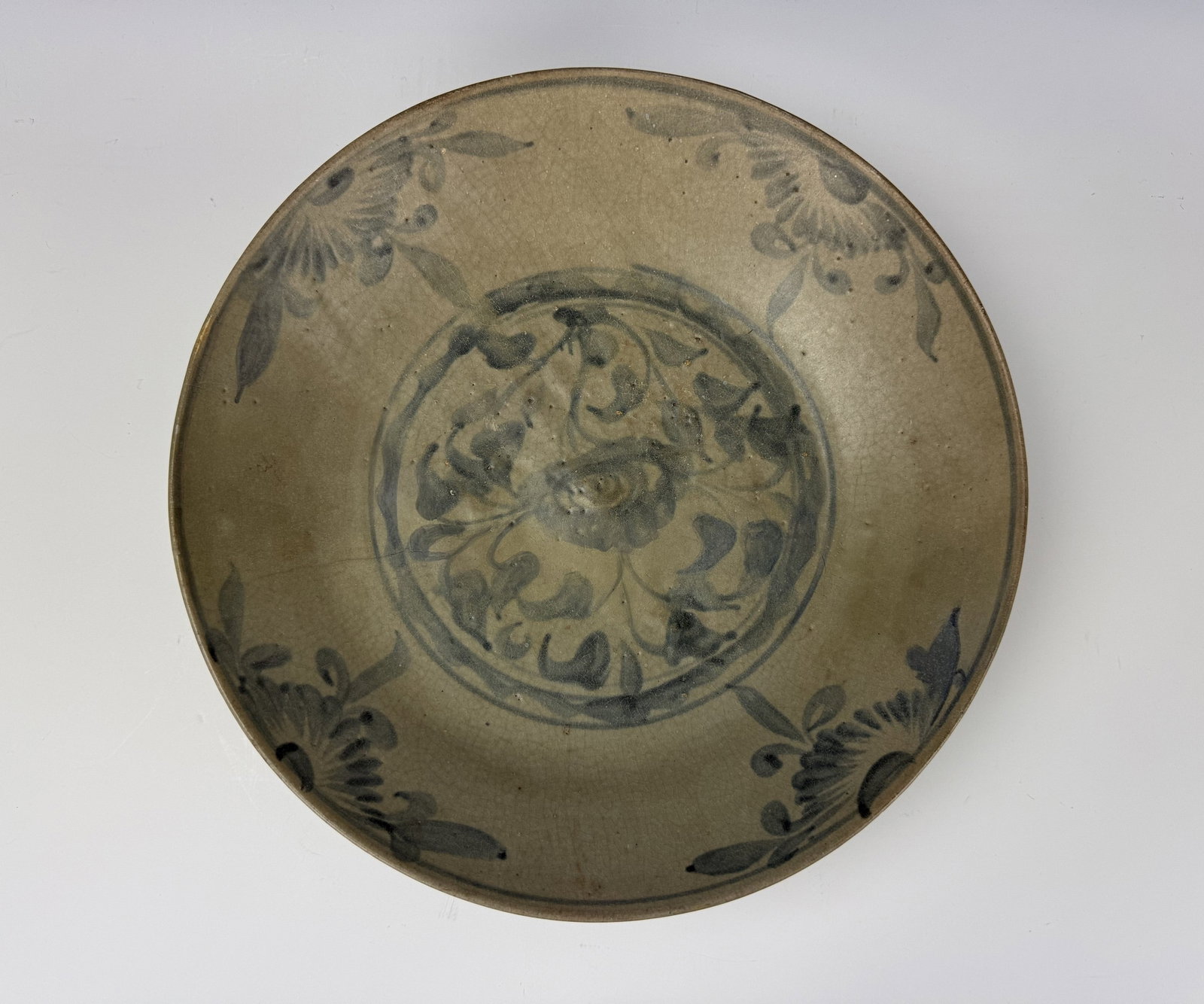 Large Antique Ceramic Bowl with Blue Gray Floral,: A Large Antique Ceramic Bowl with Blue Gray Floral, D 33 cm(13 in.) x H 7.6 cm(3.6in.). Preview from June 22nd to 26th from 1:00 PM TO 5:00 PM Eastern Time, Location: 15229 Display Court, Rockville,