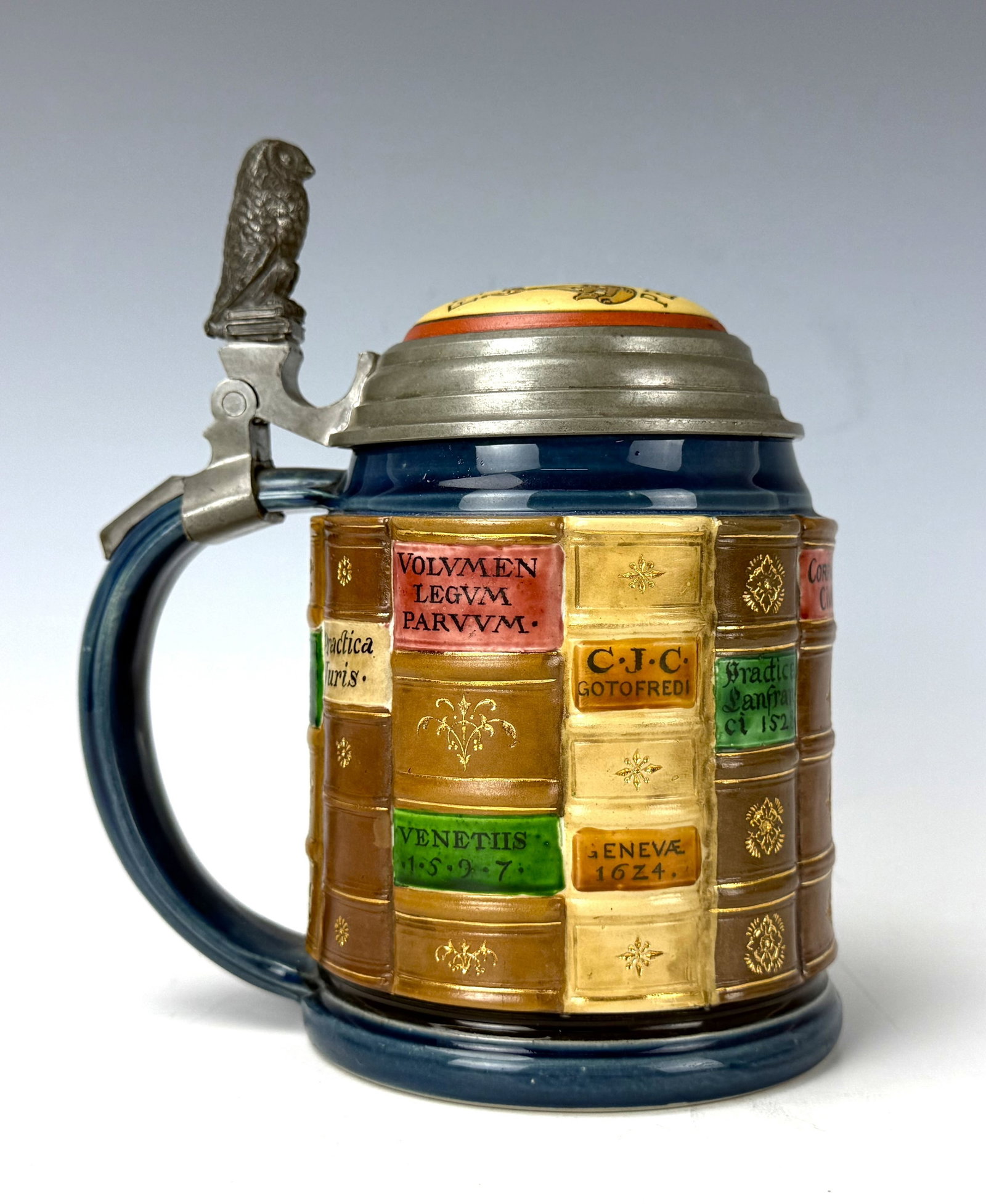 Antique Book of Spines German Mettlach Stoneware Beer Stein: Antique Book of Spines for Mathematicians Mettlach 1/2L German beer stein. H 16 cm(6.5 in.) x D 10cm(4in.). Preview from June 22nd to 26th from 1:00 PM TO 5:00 PM Eastern Time, Location: 15229