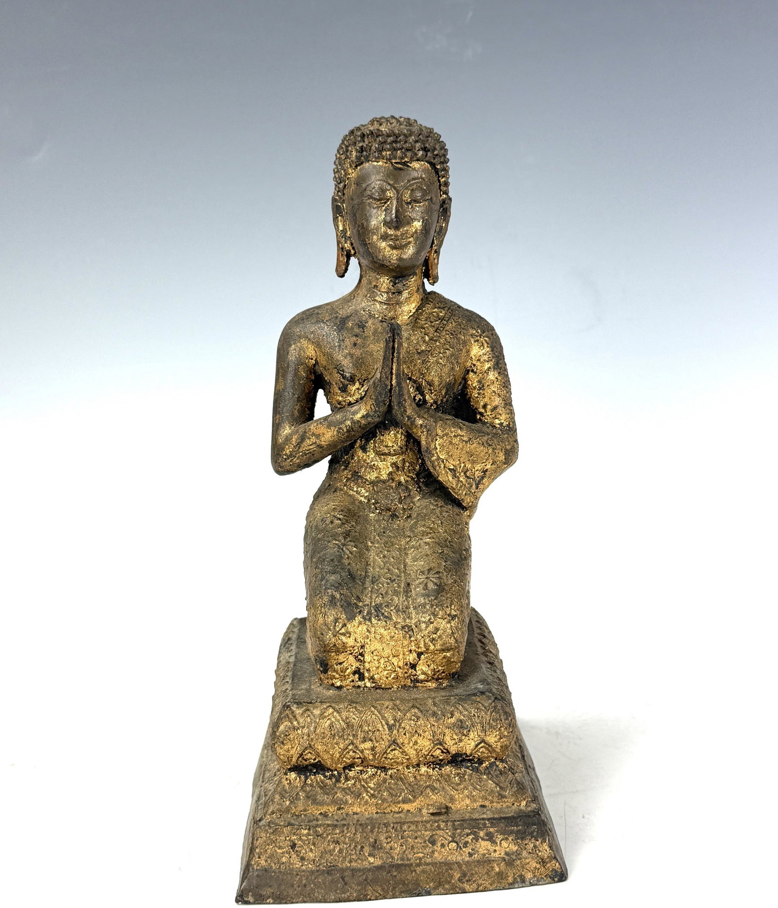 Thai Gilt Lacquered Bronze Buddha Devotional Statue: Thai Gilt Lacquered Bronze Buddha Devotional Statue. H 23 cm(9in.) x W 9.5cm (3.7in) x L12.5cm(4.9in.). Preview from June 22nd to 26th from 1:00 PM TO 5:00 PM Eastern Time, Location: 15229 Display