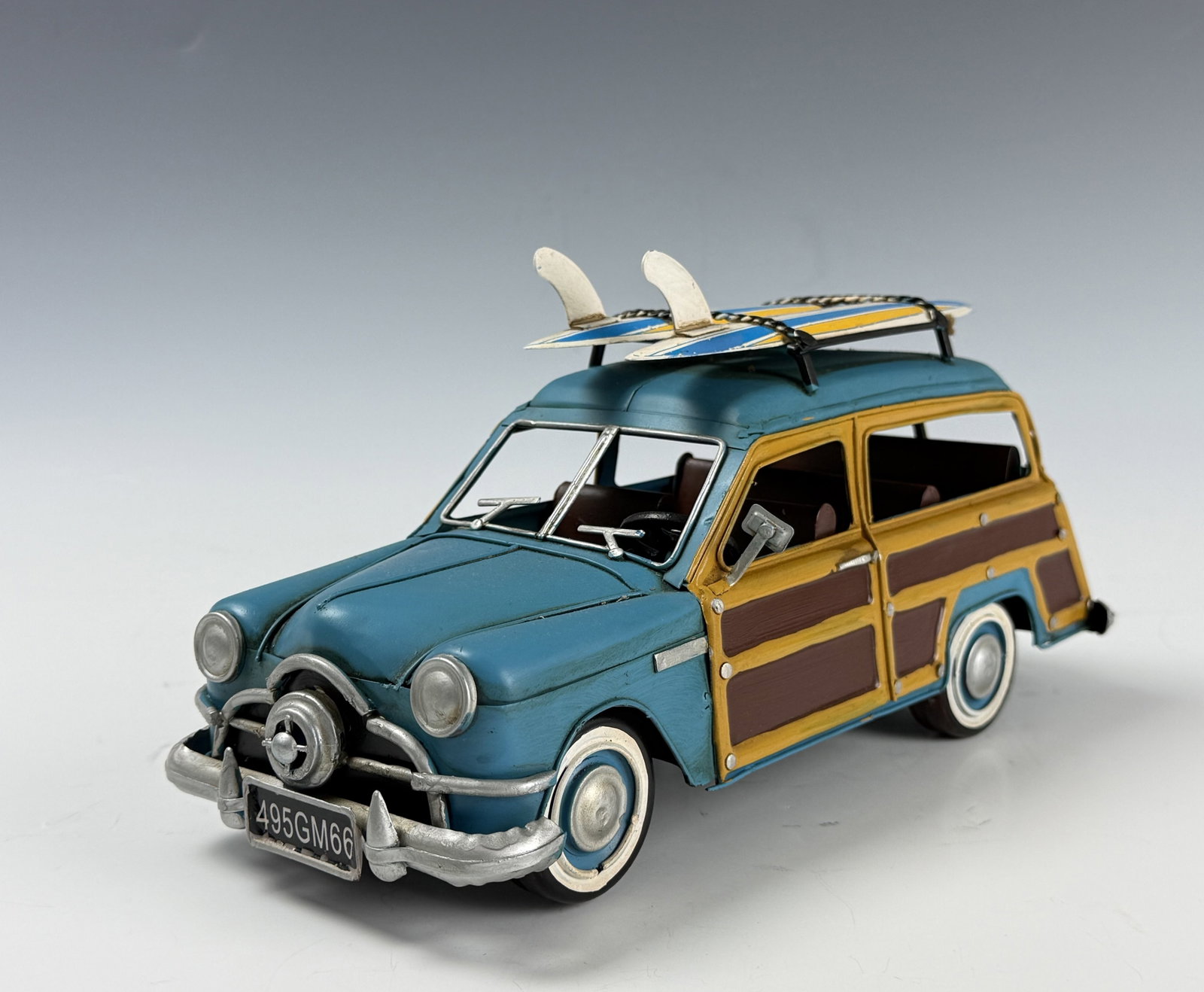 1949 Ford Station Wagon Woody Metal Car Model 12" Automobile: 1949 Ford Station Wagon Woody Metal Car Model 12" Automobile. It is made of iron and has a scale of 1:12. Preview from June 22nd to 26th from 1:00 PM TO 5:00 PM Eastern Time, Location: 15229 Display