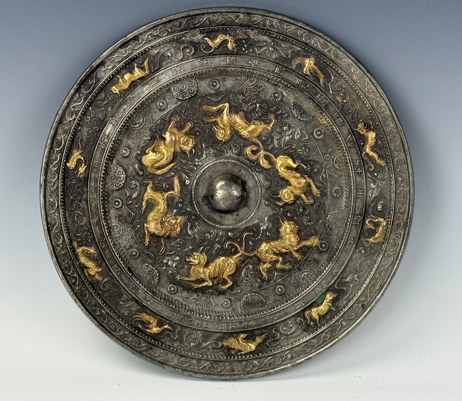 Chinese Bronze Mirror with Mythical Beast Medallions and Central Boss (1 of 6)