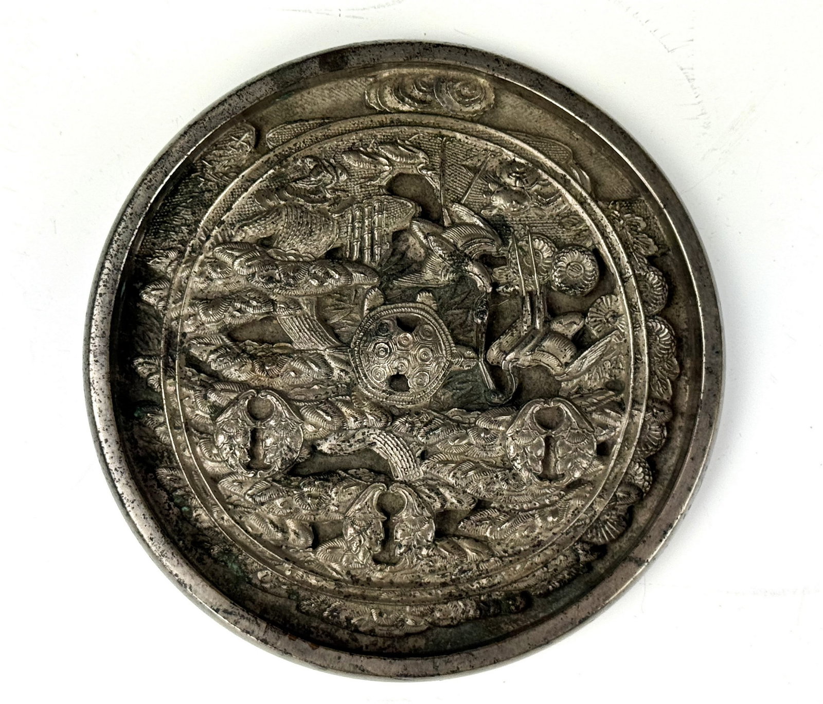 Chinese Bronze Mirror with Warrior and Beast Relief Decoration: Chinese Bronze Mirror with Warrior and Beast Relief Decoration. D 12 cm(4.7 in.). Preview from Aug 24th to 28th from 1:00 PM TO 5:00 PM Eastern Time, Location: 15229 Display Court, Rockville, MD 20850