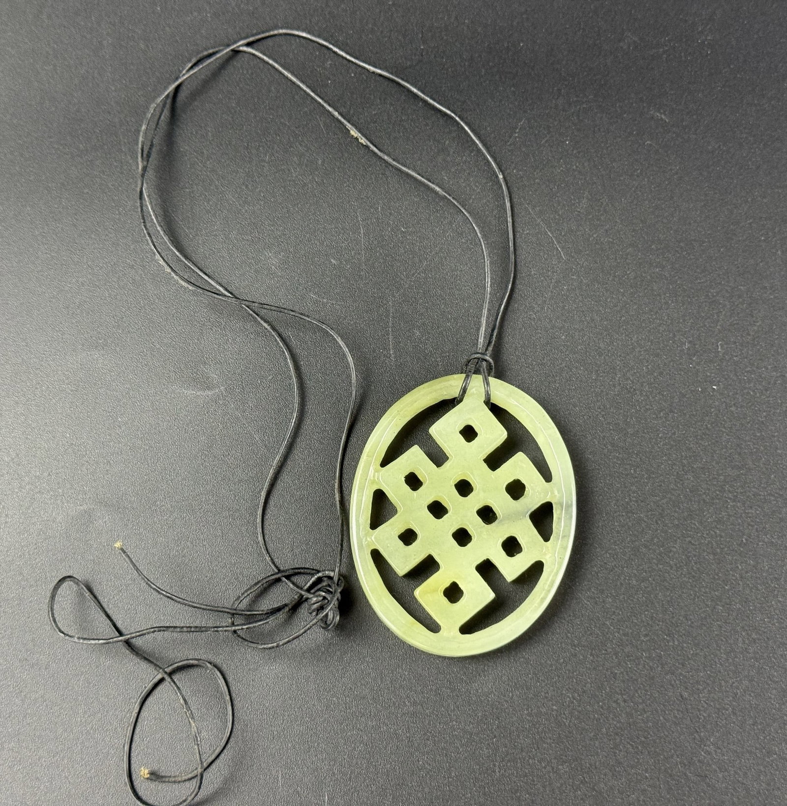 Chinese Carved Green Jade Endless Knot Pendant
