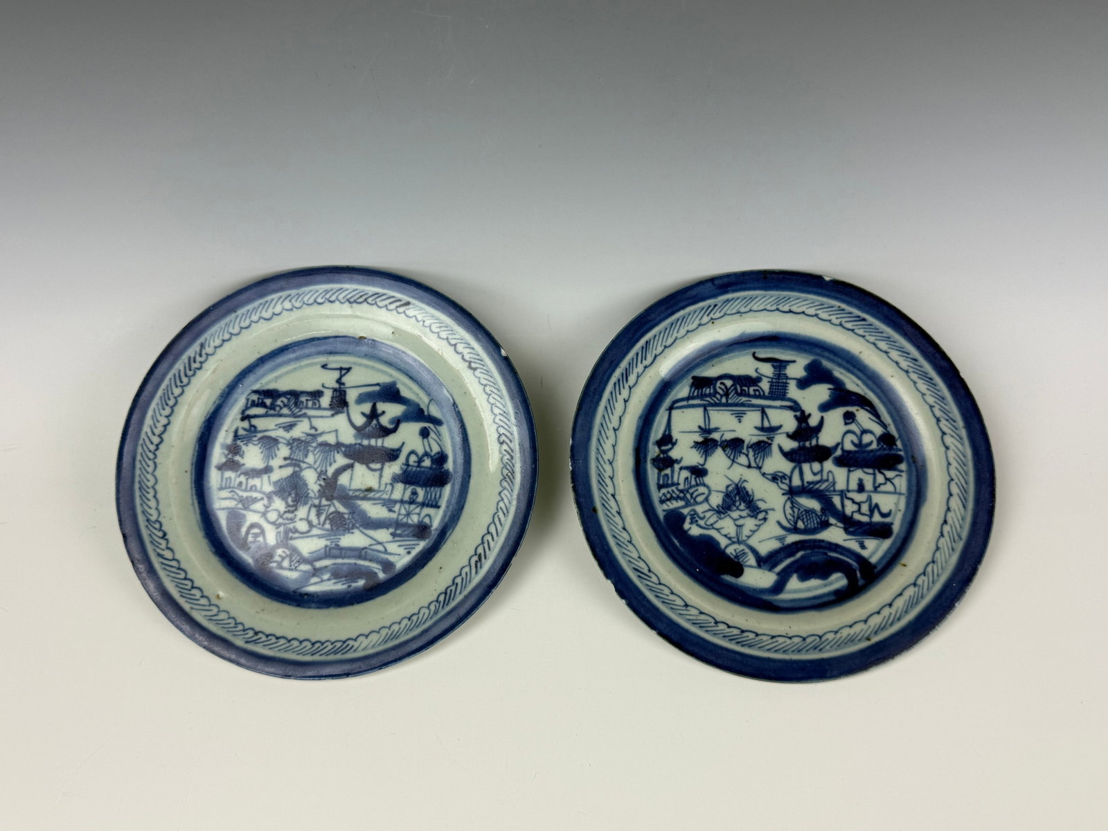 Pair of Antique Chinese Blue and White Landscape Plates: Pair of Antique Chinese Blue and White Landscape Plates. D 18.3 cm(7.2 in.) x 2. Preview from Aug 24th to 28th from 1:00 PM TO 5:00 PM Eastern Time, Location: 15229 Display Court, Rockville, MD 20850.