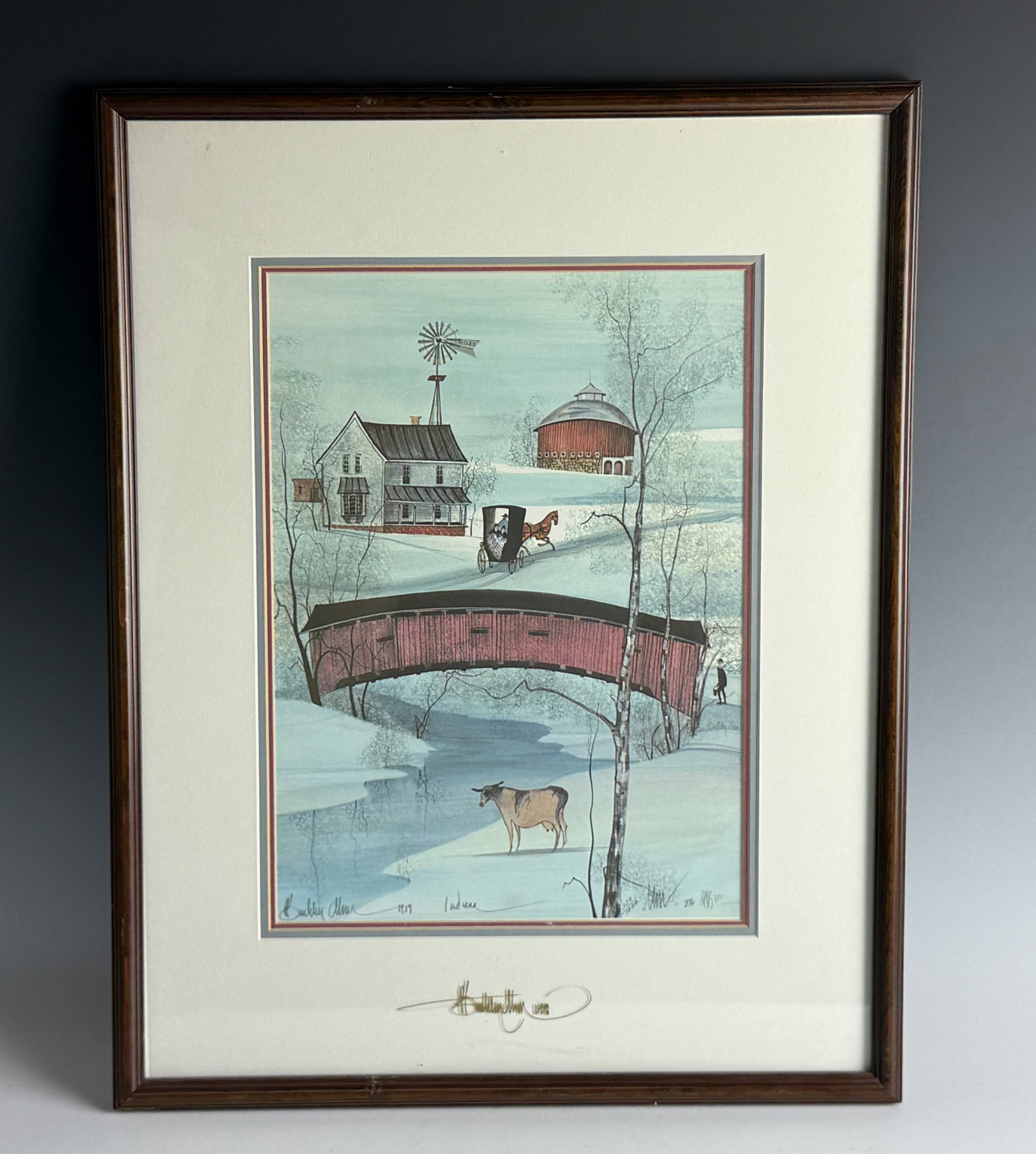 Winter Landscape Indiana Signed by P. Buckley Moss Numbered Print: Winter Landscape Indiana Signed by P. Buckley Moss (1989) Numbered Print. H 36.6 cm(14.4 in.) x W 26 cm(10.2 in.). Preview from Aug 24th to 28th from 1:00 PM TO 5:00 PM Eastern Time, Location: 15229 D