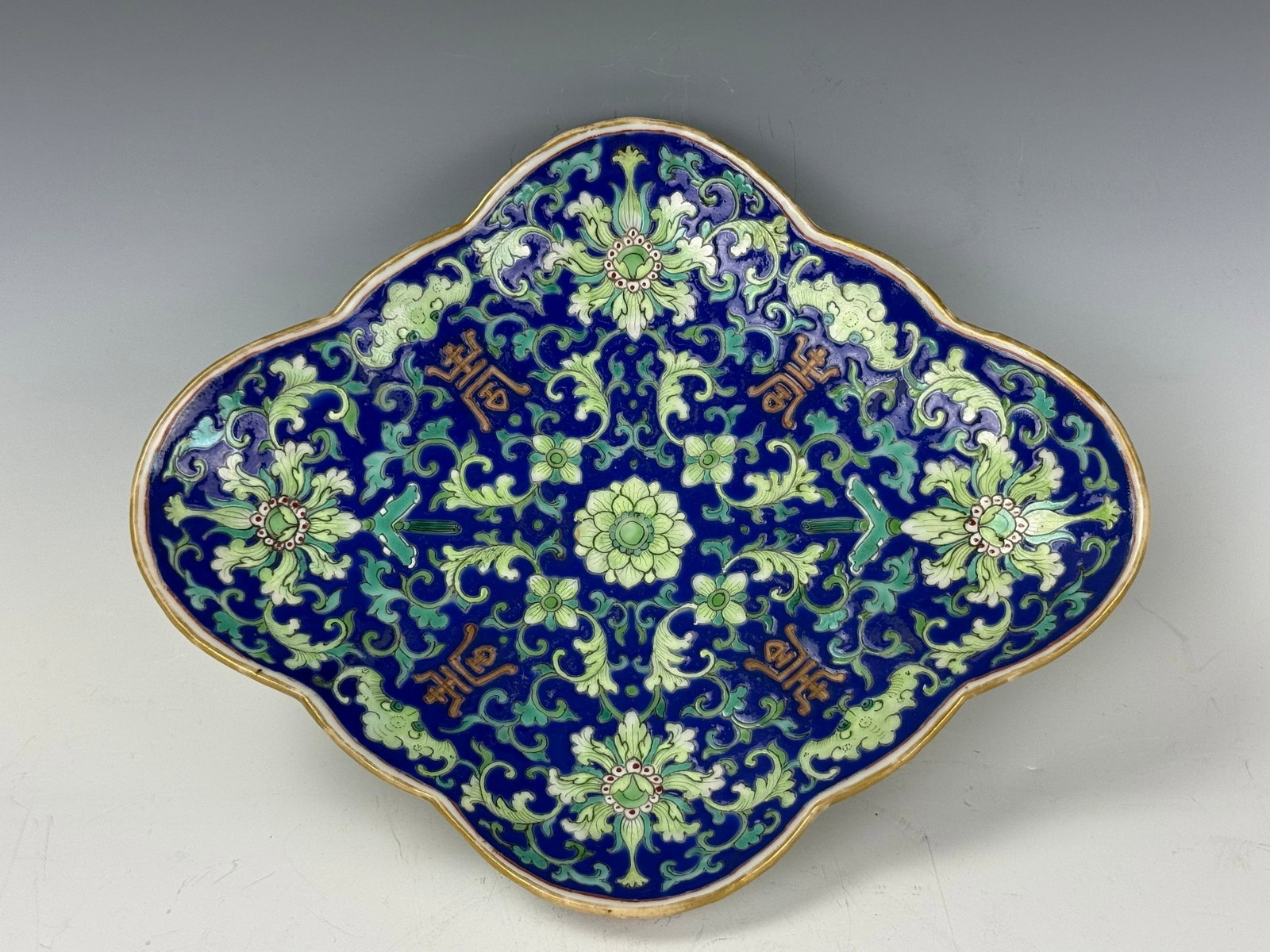 Chinese Famille Rose Porcelain Footed Plate with Tongzhi Mark: Chinese Famille Rose Footed Plate with Cobalt Blue Enamel and Floral Motifs. W 27 cm(10.6 in.) x H 5.4 cm(2.1 in.),Preview from Aug 24th to 28th from 1:00 PM TO 5:00 PM Eastern Time, Location: 15229 D