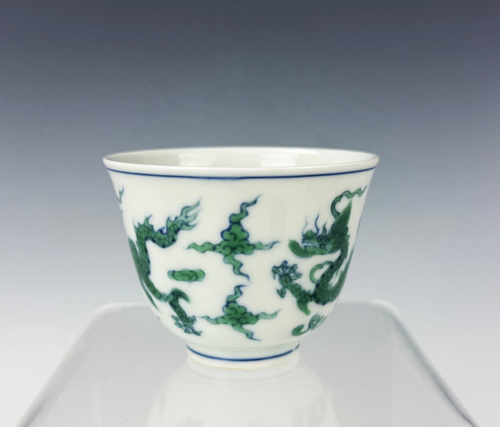 Chinese Doucai Enamel Porcelain Wine Cup with Chenghua Mark: Doucai Enamel Wine Cup Painted with Dragons Chenghua Mark. D 7 cm(2.8 in.) x H 5.3 cm(2.1 in.). Preview from Aug 24th to 28th from 1:00 PM TO 5:00 PM Eastern Time, Location: 15229 Display Court, Rockv