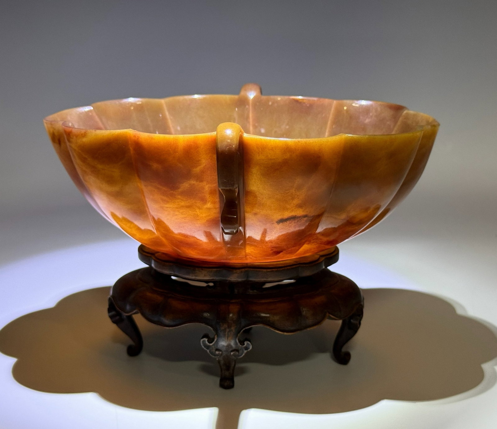 Chinese Carved Agate Bowl with Fitted Wood Stand and Box: Chinese carved agate Bowl on a fitted wood stand, The vessel features a distinctive lotus or lace petal form with integrated handles,with original fitted box. bowl size W 17.4 cm(6.9 in.) x L 13 cm(5.