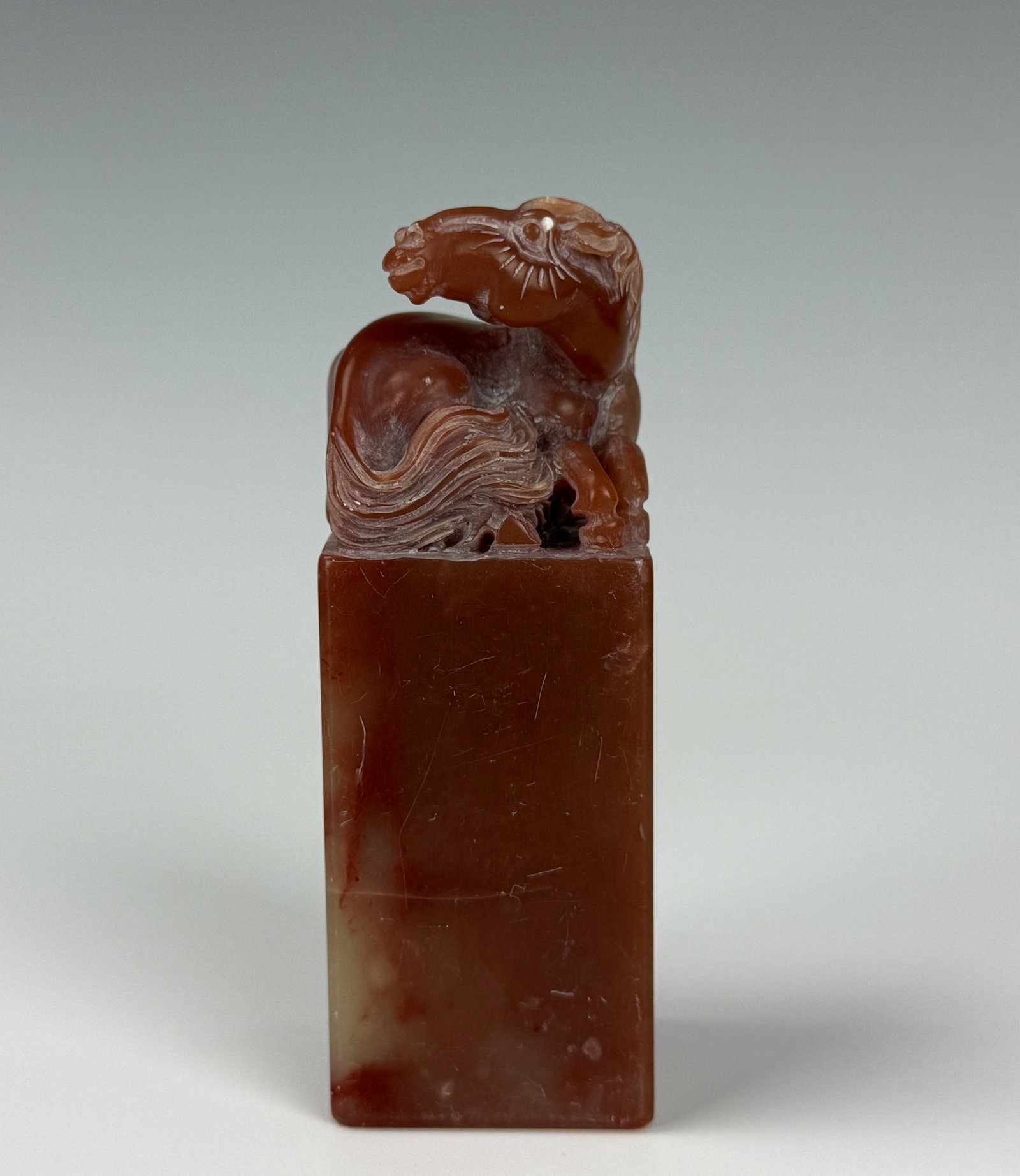 A Shoushan Stone Success Upon Arrival Horse Finial Square Seal Material: Chinese Shoushan Chicken Blood Stone Success Upon Arrival Horse Finial Square Seal Material. H 9 cm(3.5 in.) x W 3 cm(1.2 in.). Preview from Aug 24th to 28th from 1:00 PM TO 5:00 PM Eastern Time, Loca