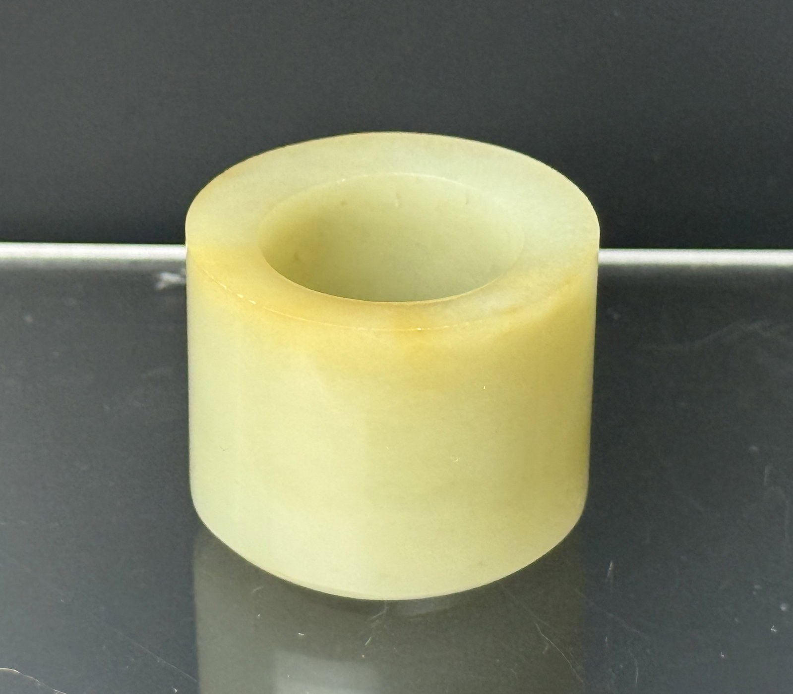 A Chinese Hetian Jade Archer Ring: Chinese Hetian Jade Archer Ring,size 3.5 x 3 cm. Preview from Aug 24th to 28th from 1:00 PM TO 5:00 PM Eastern Time, Location: 15229 Display Court, Rockville, MD 20850.