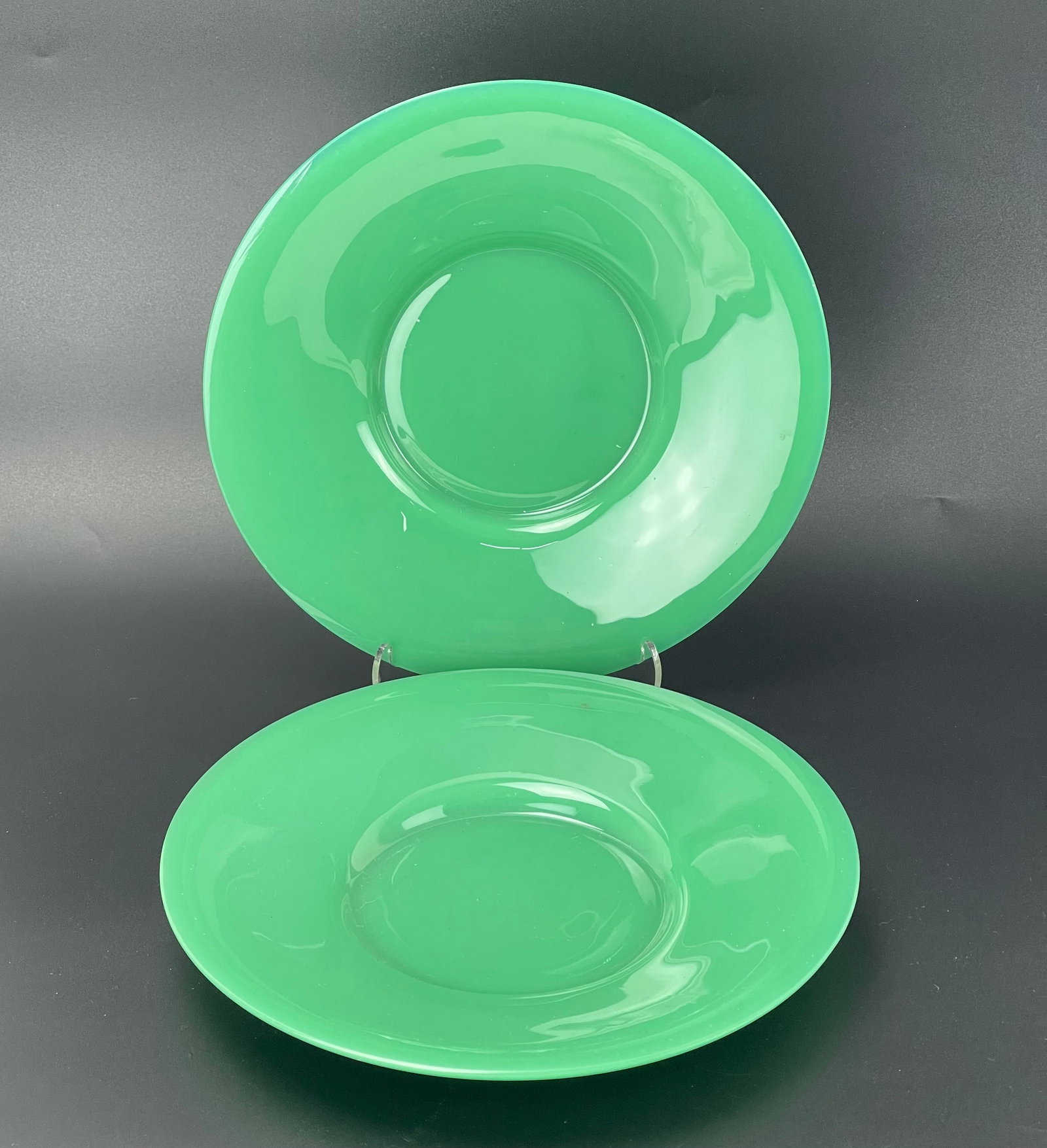 Pair of Green Chinese Antique Peking Glass Plates: Pair of Green Chinese Antique Peking Glass Plates. D 20 cm(8 in.)x2. Preview from Aug 24th to 28th from 1:00 PM TO 5:00 PM Eastern Time, Location: 15229 Display Court, Rockville, MD 20850.