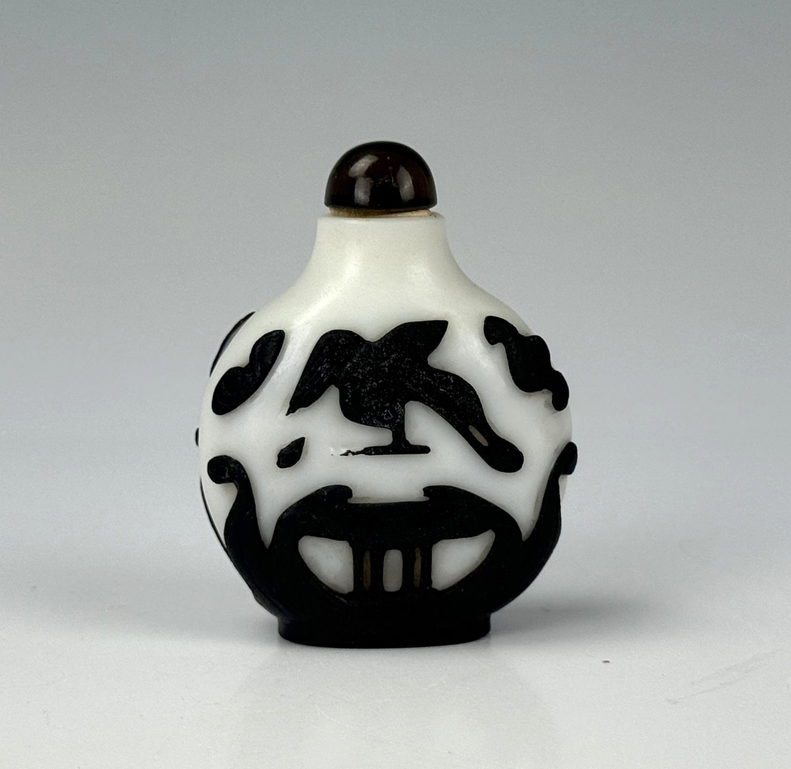 Chinese Peking Glass Snuff Bottle with Black Overlay of an Eagle (1 of 4)