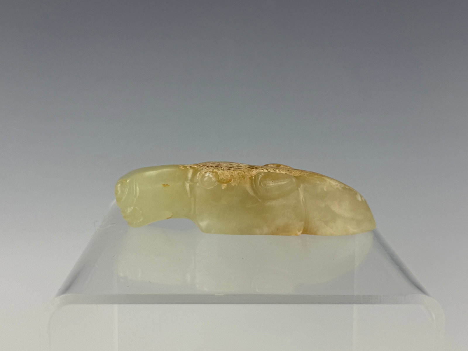 Chinese Whitish Celadon Jade with Calcification Horse Head: Whitish Celadon Jade with Calcification Carved Horse Head. L 8.5 cm(3.3 in.). Preview from Aug 24th to 28th from 1:00 PM TO 5:00 PM Eastern Time, Location: 15229 Display Court, Rockville, MD 20850.