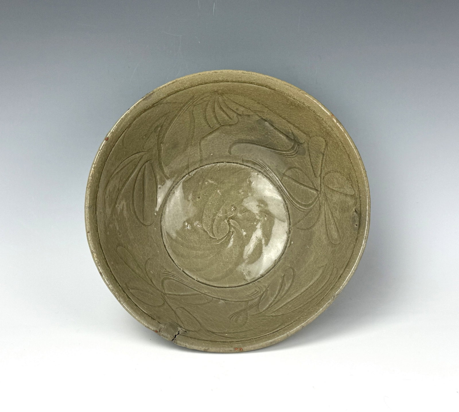 Antique Chinese Song Dynasty Celadon Bowl with Incised Floral Patterns: Antique Chinese Song Dynasty Celadon Bowl with Incised Floral Patterns, D 18.3 cm(7.2 in.) x H 7.8 cm(3.1 in.). Preview from Aug 24th to 28th from 1:00 PM TO 5:00 PM Eastern Time, Location: 15229 Disp