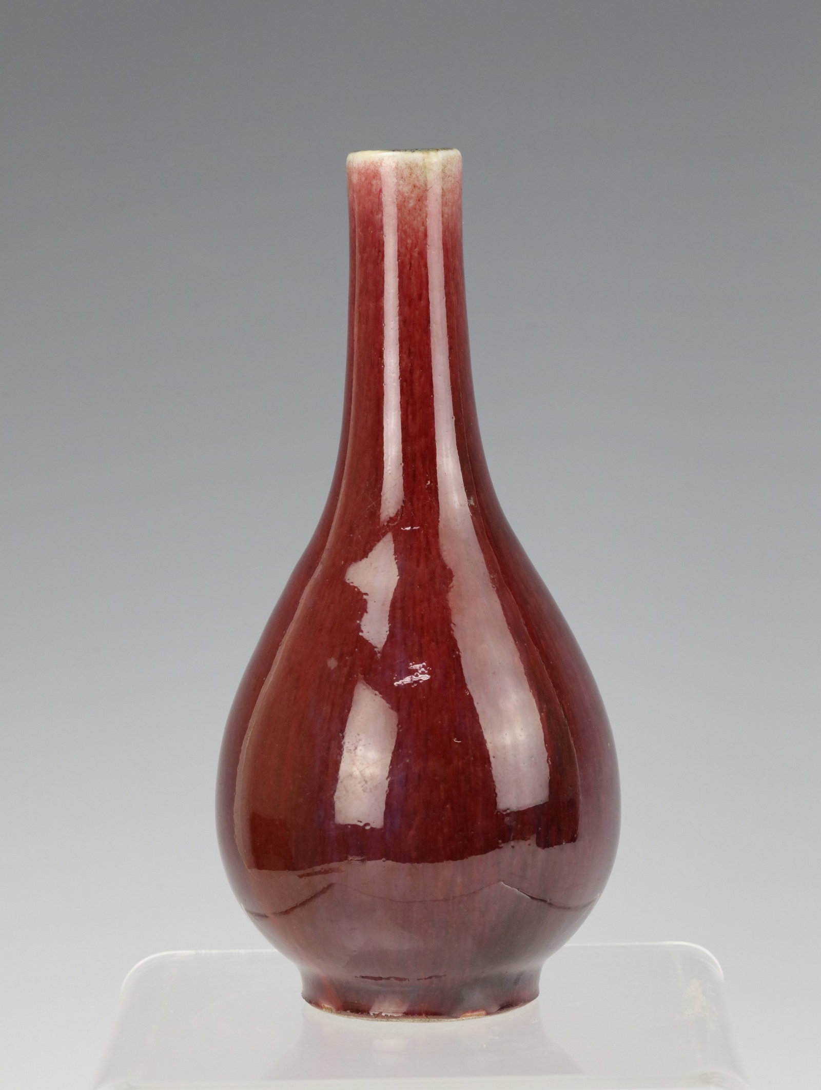Chinese Qing Dynasty Copper Red Glazed Porcelain Vase Kanxi Mark: Chinese Qing Dynasty Copper Red Glazed Porcelain Vase Kanxi Mark. H 18.4 cm(7.2 in.).Provenance from Lieutenant General James Soligan. Preview from Aug 24th to 28th from 1:00 PM TO 5:00 PM Eastern Tim