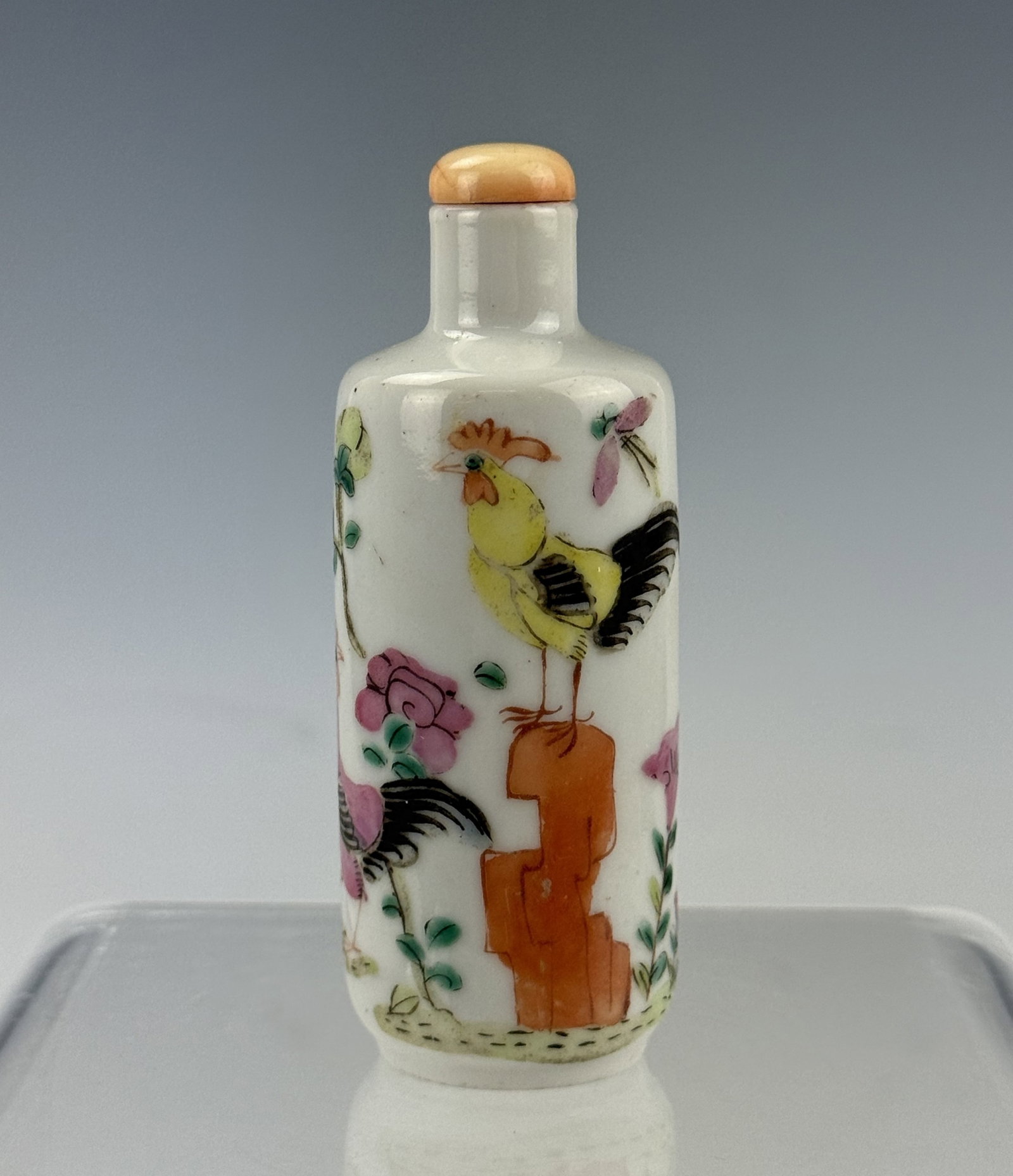 Chinese Famille Rose Porcelain Snuff Bottle with Qianlong Mark: Chinese Porcelain Snuff Bottle with Polychrome Rooster and Floral Decoration. H 8 cm(3.1 in.), Preview from Aug 24th to 28th from 1:00 PM TO 5:00 PM Eastern Time, Location: 15229 Display Court, Rockvi