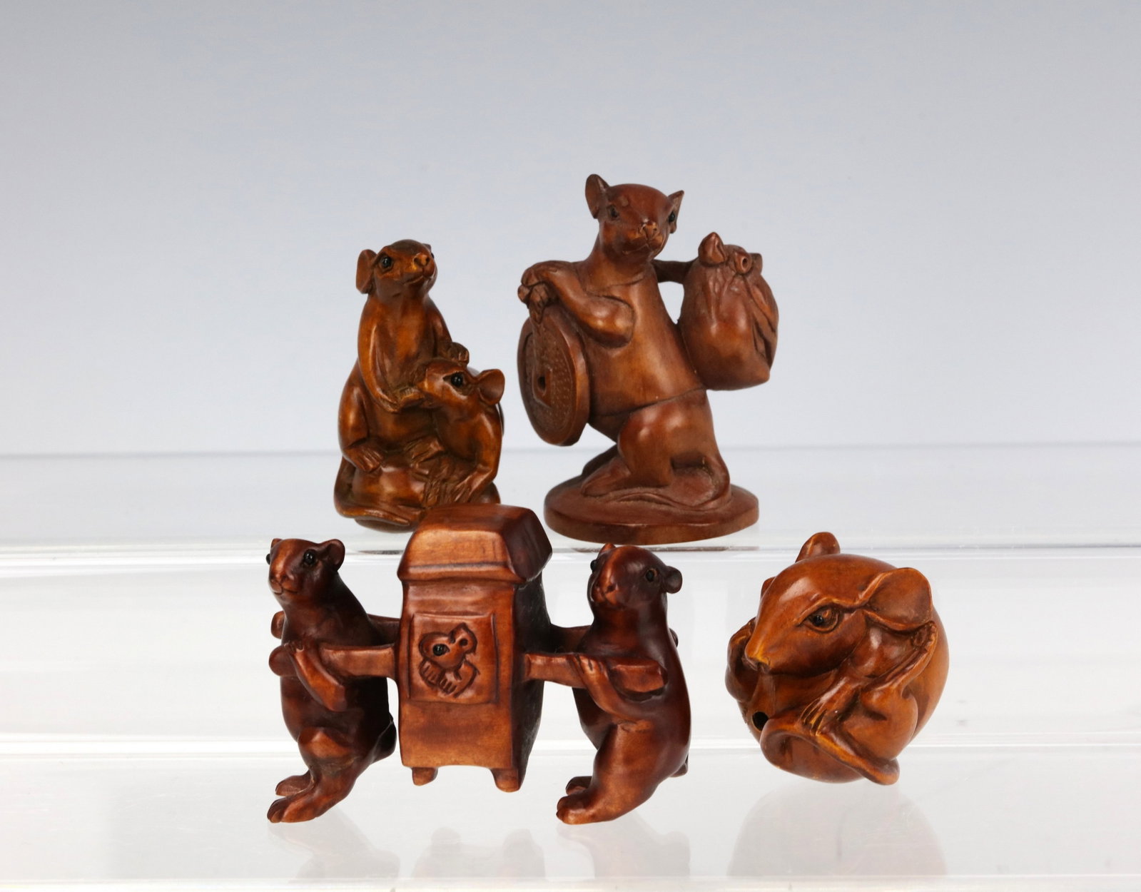 Group of 4 Carved Wooden Mouse Figurines Miniature Netsuke: Set of Four Carved Wooden Mouse Figurines Miniature Netsuke Style Group. H 5.5 cm(2.2 in.). Preview from Aug 24th to 28th from 1:00 PM TO 5:00 PM Eastern Time, Location: 15229 Display Court, Rockville
