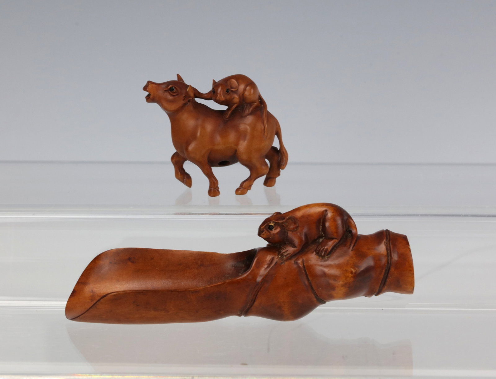 Japanese Carved Wooden Mouse Riding Bull and Tea Spoon: A Wooden Animal Figurines Mouse Riding Bull and on Bamboo Spoon. L 11.5 cm(4.5 in.). Preview from Aug 24th to 28th from 1:00 PM TO 5:00 PM Eastern Time, Location: 15229 Display Court, Rockville, MD 20
