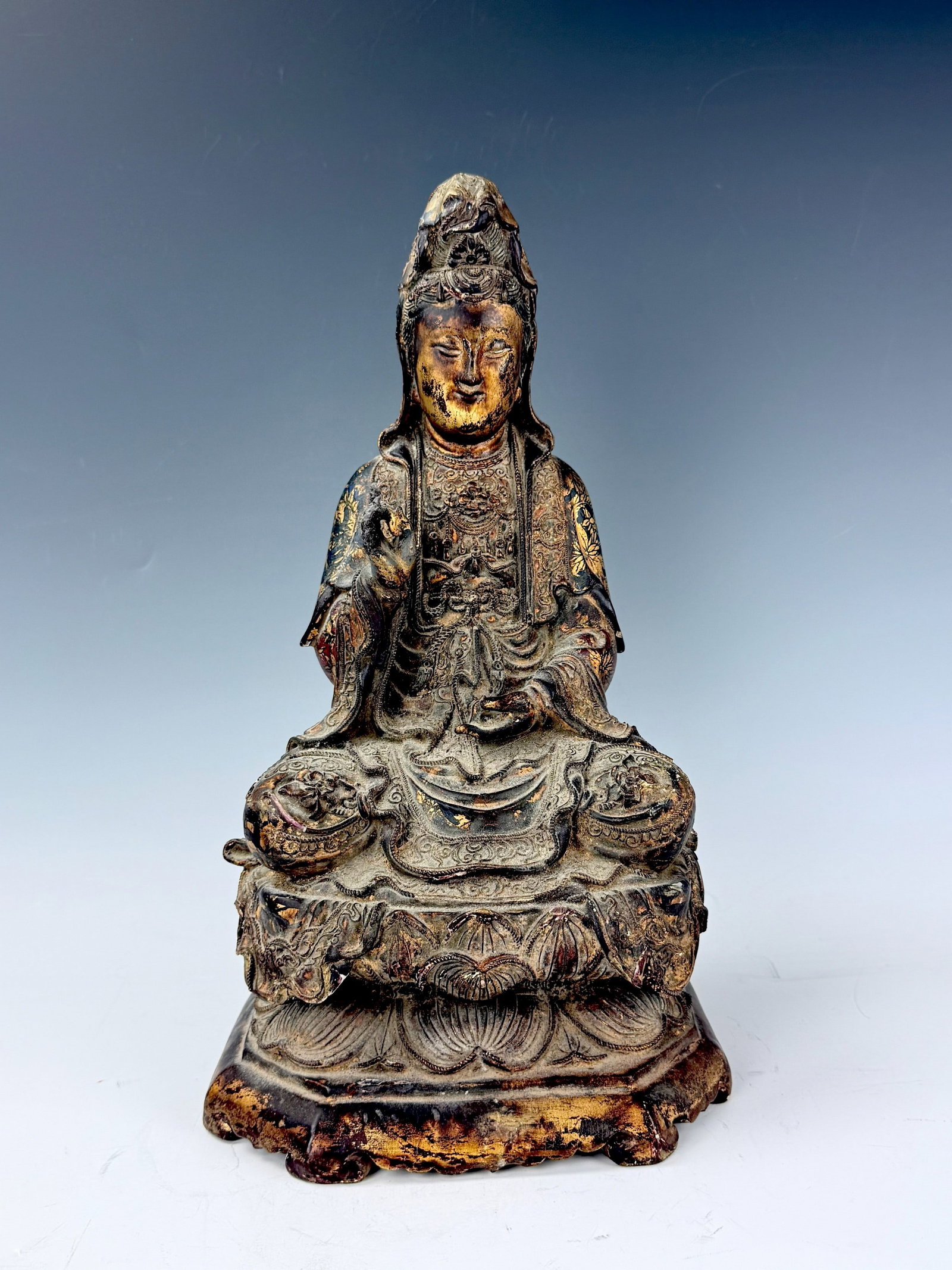 Chinese Gilded Wood Guanyin Buddha Staue: Chinese Gilded Wood Guanyin Buddha Staue. H 40 cm(15.7 in.) x W 21.8 cm(8.6 in.). Preview from Aug 24th to 28th from 1:00 PM TO 5:00 PM Eastern Time, Location: 15229 Display Court, Rockville, MD 20850