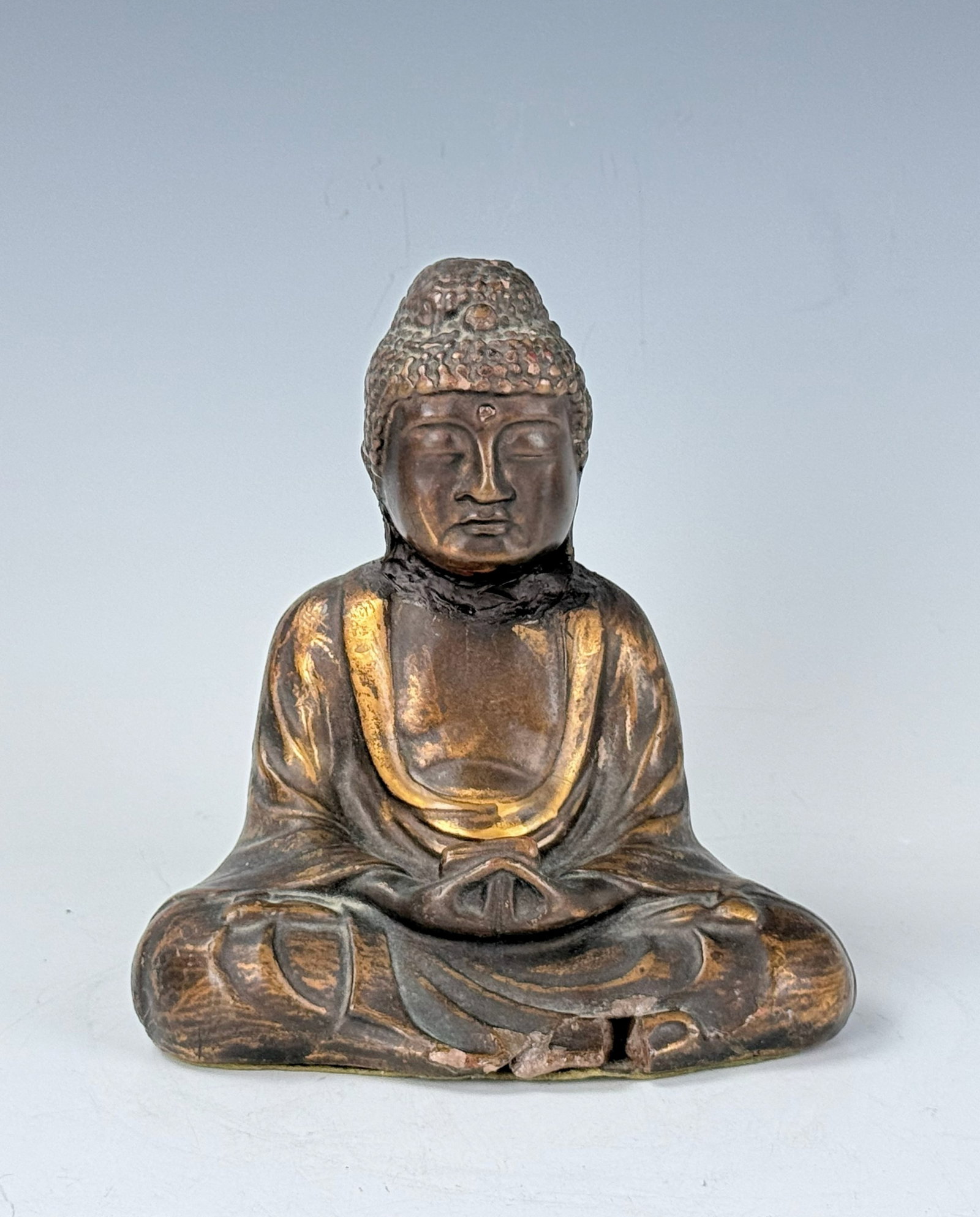 A Vintage Carved Wood Seated Buddha: A Vintage Carved Wood Seated Buddha. H 15.5 cm(6.1 in.) x W 14 cm(5.5 in.). Preview from Aug 24th to 28th from 1:00 PM TO 5:00 PM Eastern Time, Location: 15229 Display Court, Rockville, MD 20850.